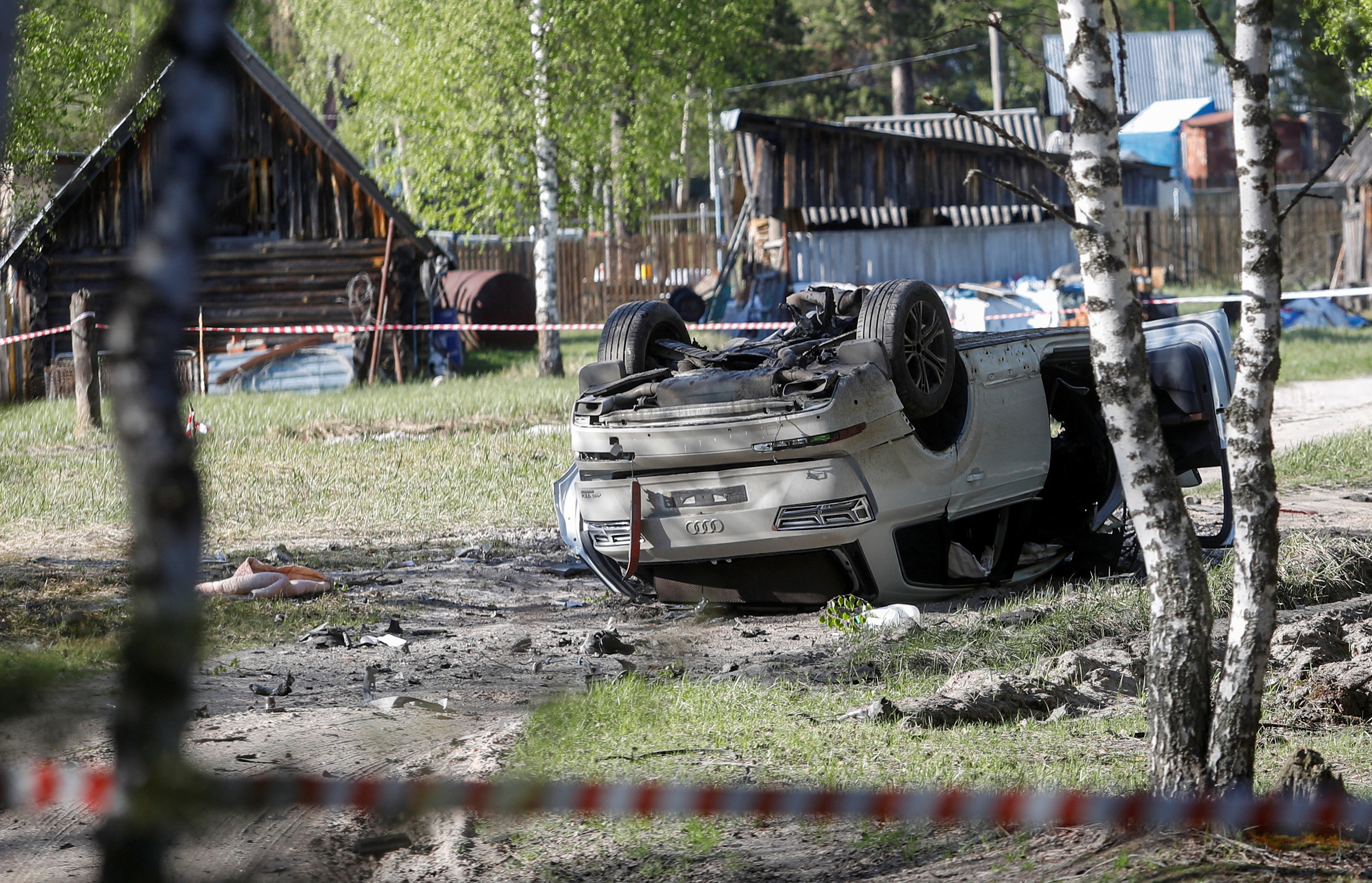 A damaged car overturned after Russian nationalist writer Zakhar Prilepin was allegedly wounded in a bomb attack in the Nizhny Novgorod region, Russia, on Saturday.