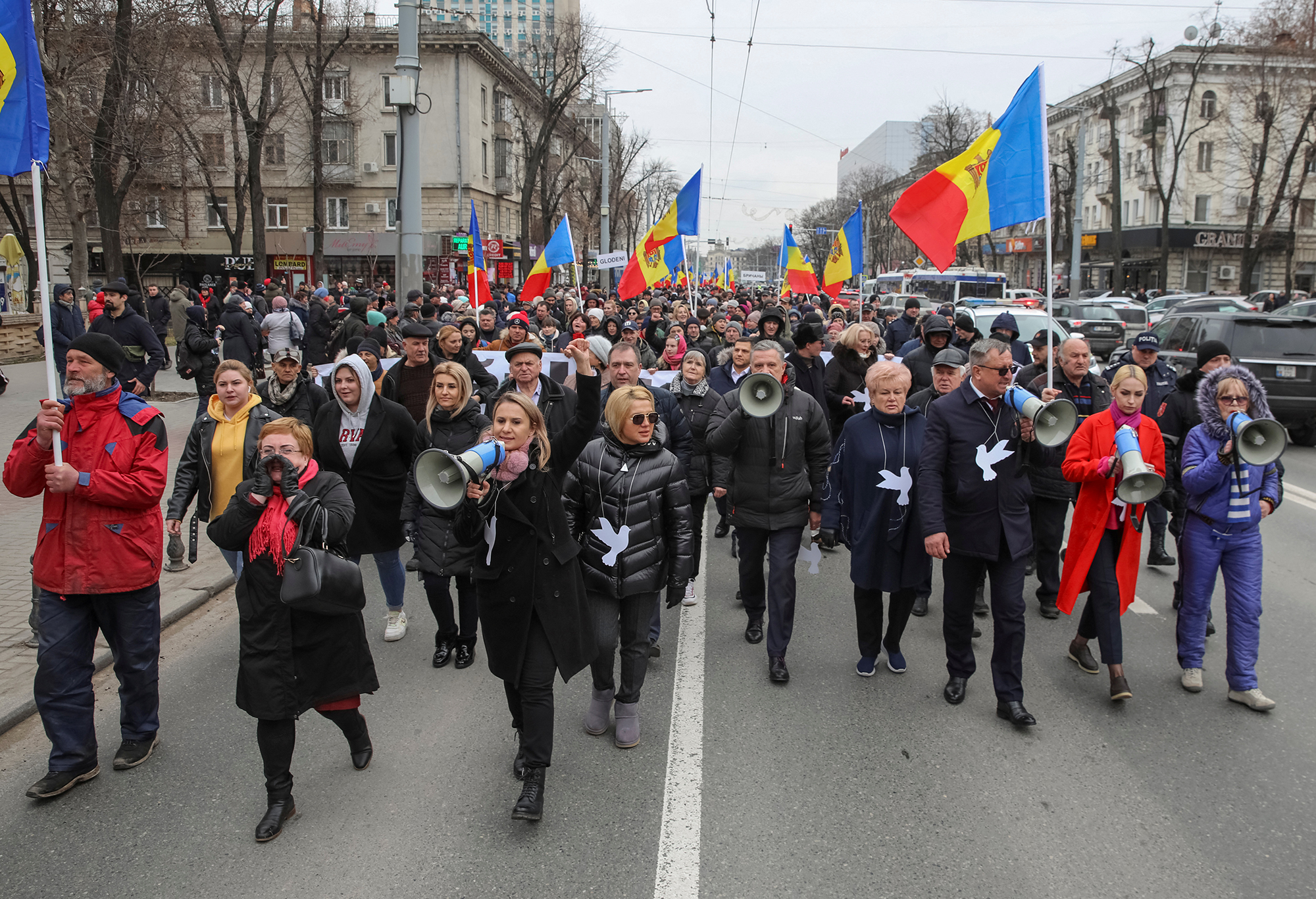 People take part in an opposition rally to protest against the recent countrywide increase of power rates and prices in Chisinau, Moldova, on February 28.
