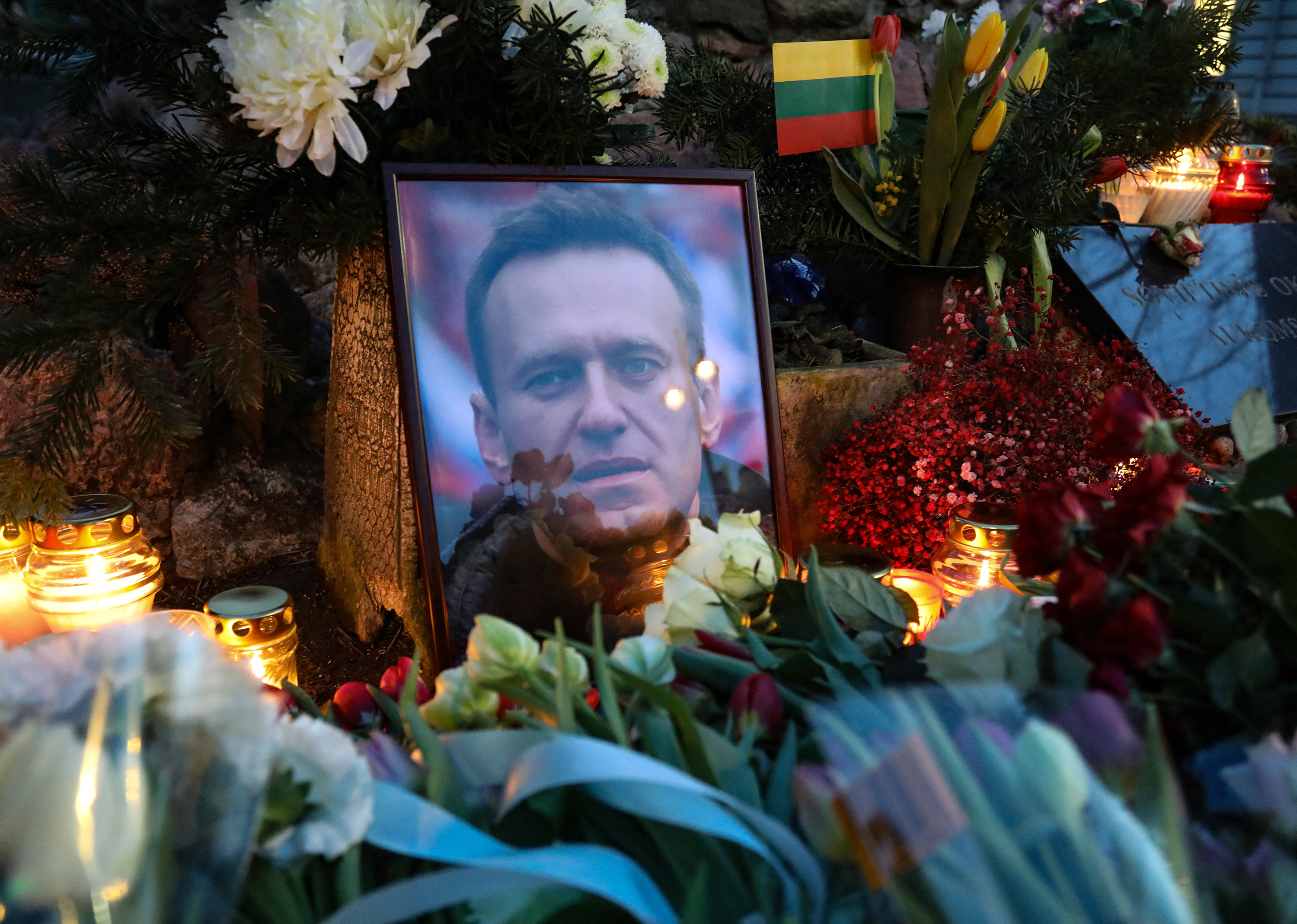 Flowers lie at a makeshift memorial for Alexey Navalny in Vilnius, Lithuania, on February 16.