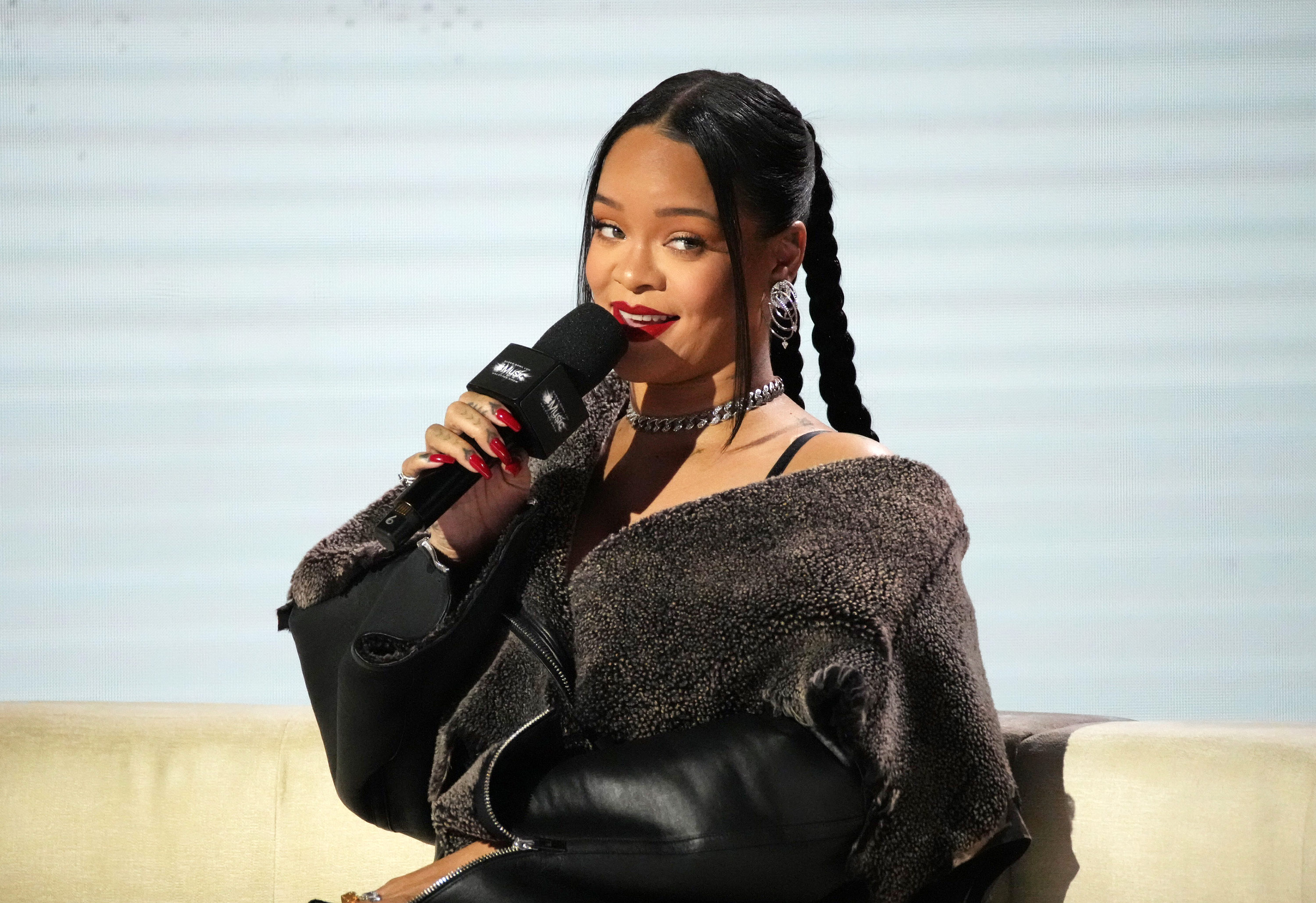 Rihanna speaks during a press conference on February 9, in Phoenix, Arizona. 