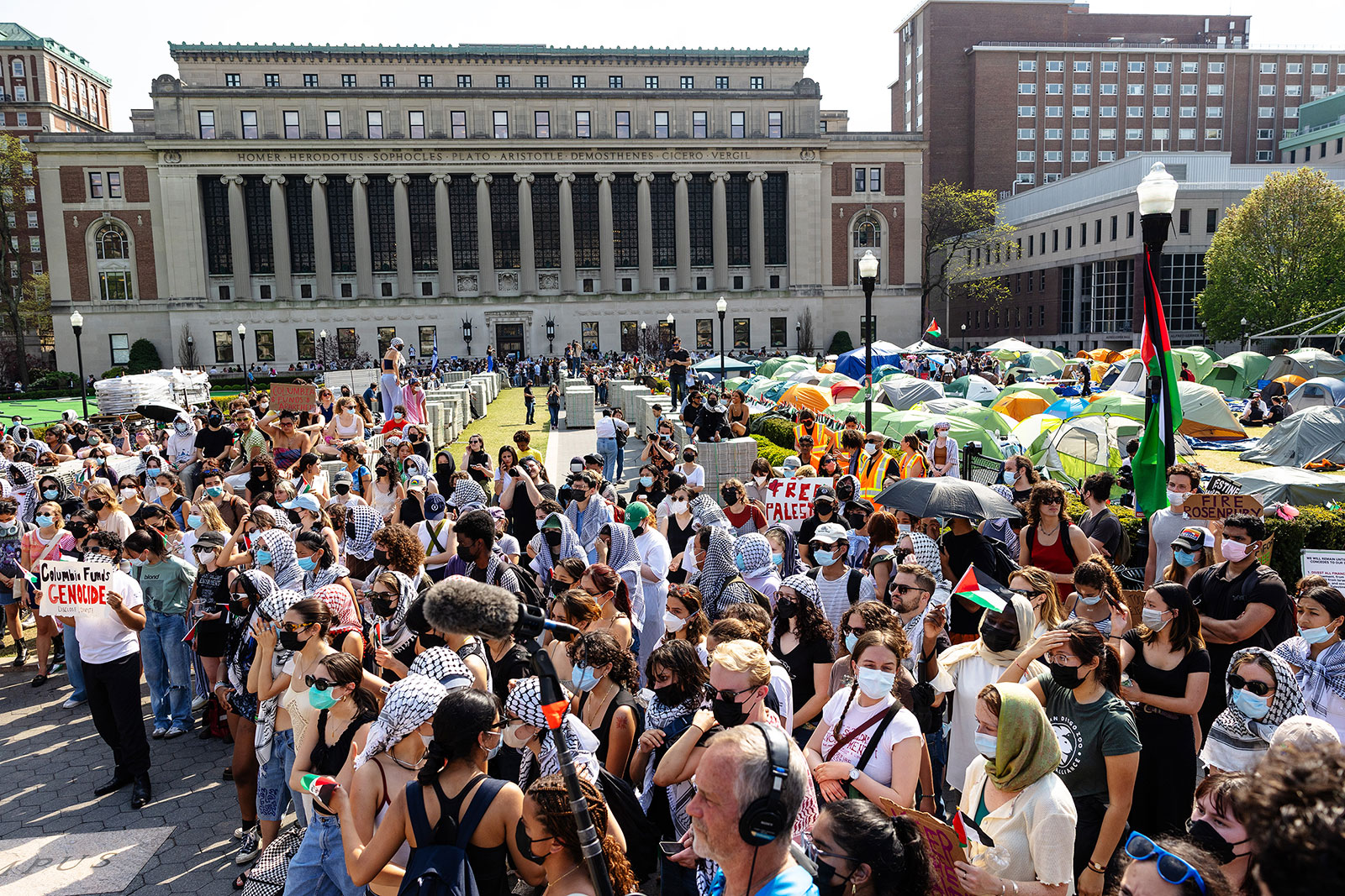 Pro-Palestinian demonstrators hold a short rally after marching around the "Gaza Solidarity Encampment" in the West Lawn of Columbia University on Monday, April 29, in New York.