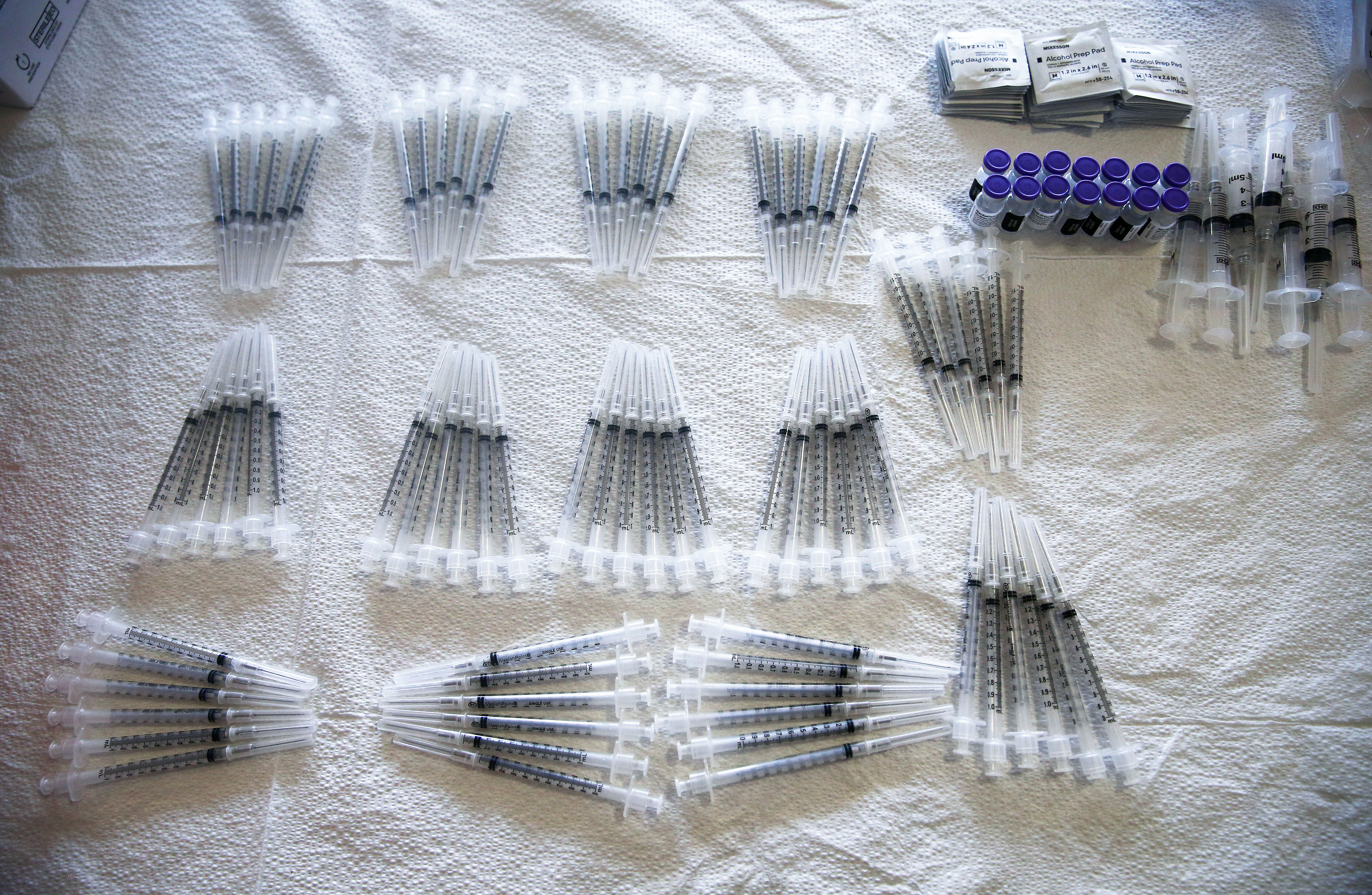 Syringes are prepared for doses of the Pfizer Covid-19 vaccine on April 9 in Los Angeles.