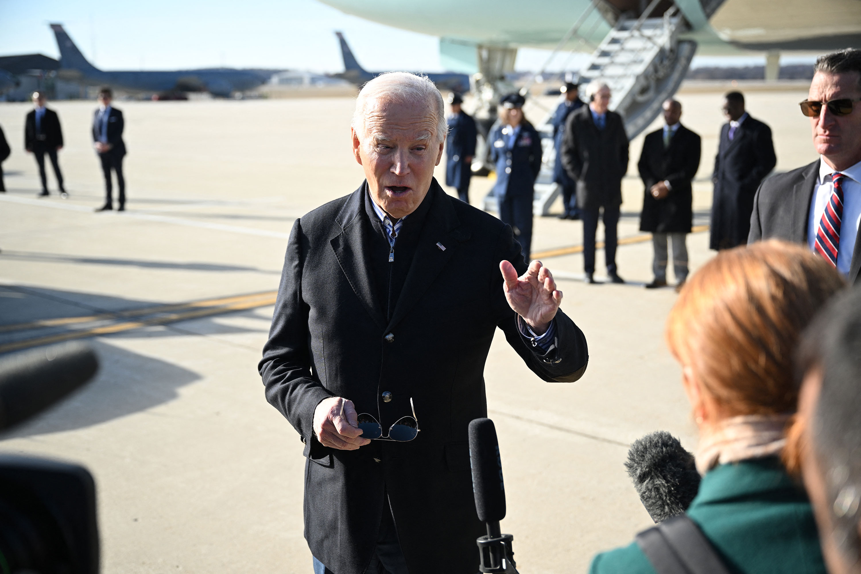 President Joe Biden speaks to the media upon arrival in Milwaukee on Wednesday.
