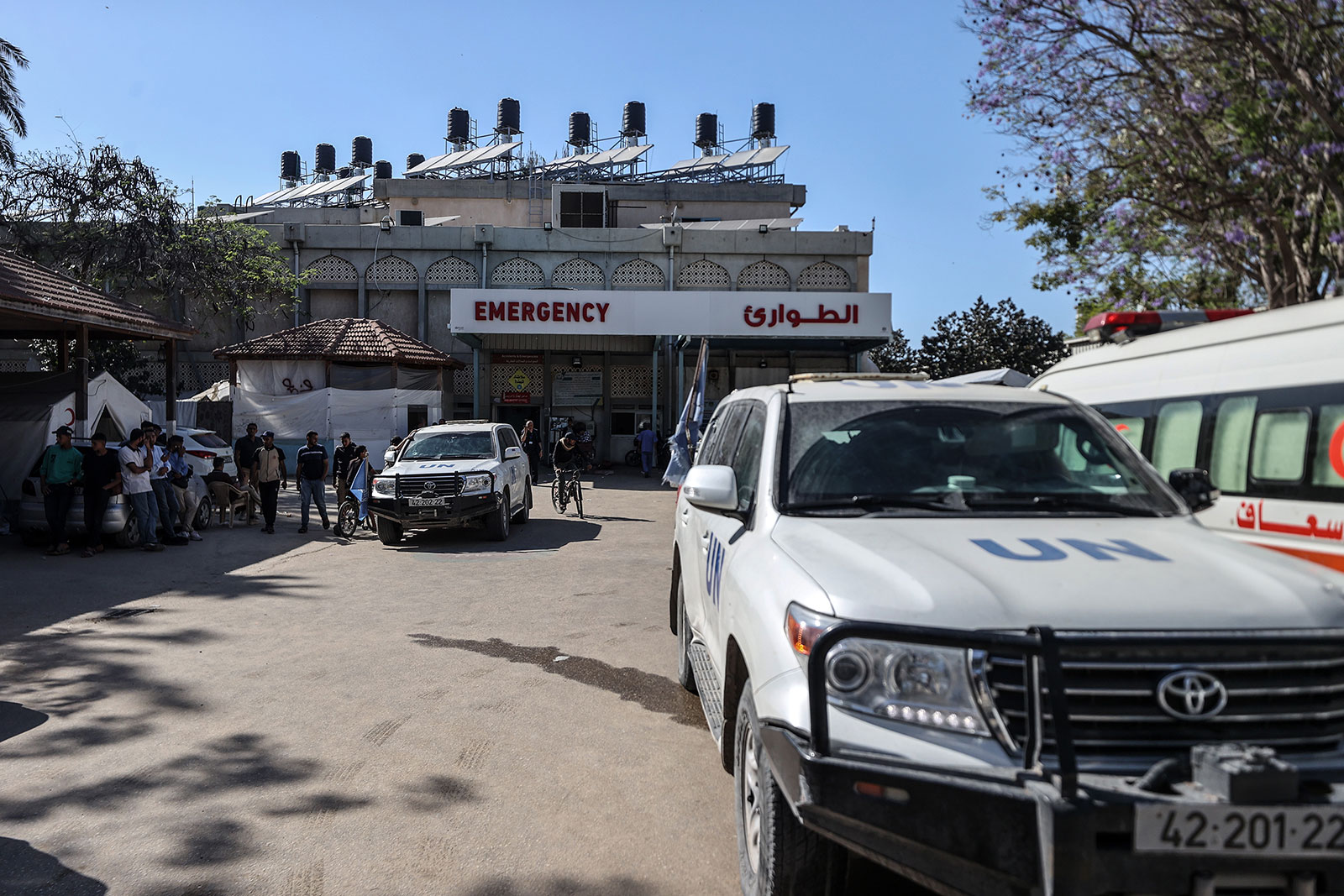 A damaged United Nations vehicle is seen in front of a hospital after a UN employee was killed in an attack on a vehicle in Gaza, according to Israeli media.
