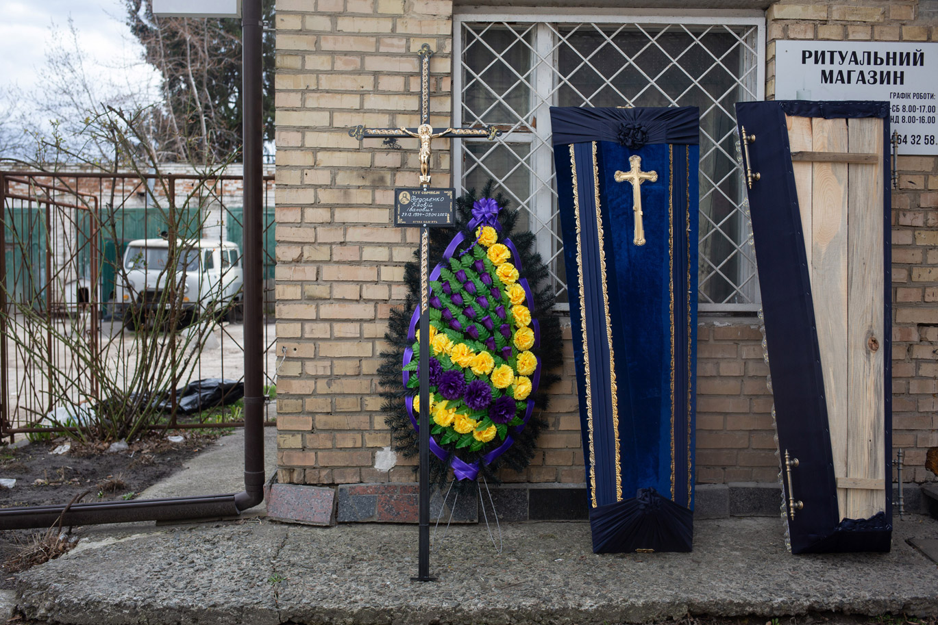 A view of a cross and coffin prepared for a funeral of a civilian killed by the confilict in Bucha, Ukraine, on April 12.