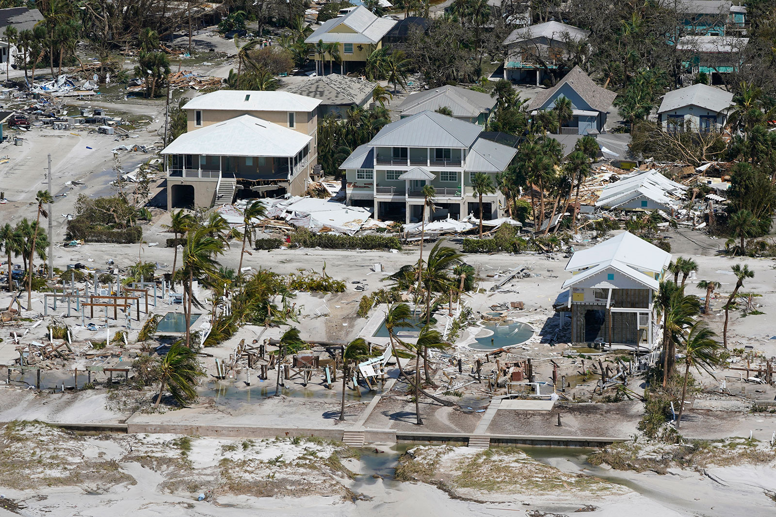 Damaged and missing homes are seen in Fort Myers Beach, Florida. 