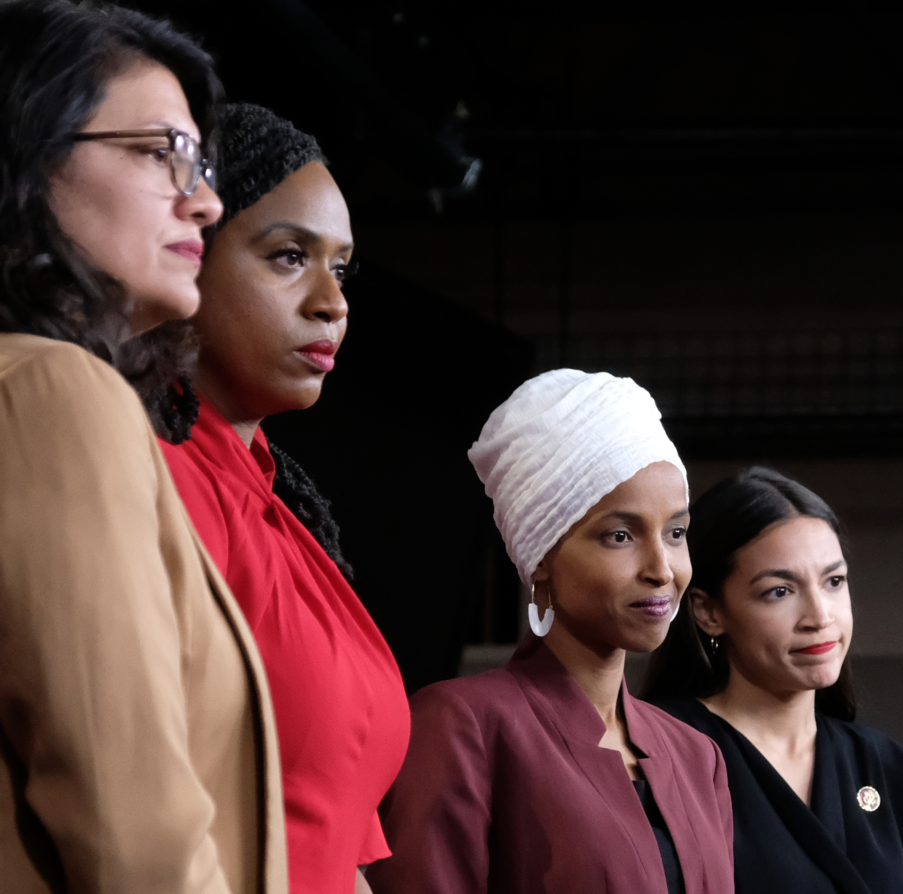 U.S. Rep. Rashida Tlaib (D-MI), Rep. Ayanna Pressley (D-MA), Rep. Ilhan Omar (D-MN), and Rep. Alexandria Ocasio-Cortez (D-NY) pause between answering questions during a press conference at the U.S. Capitol on July 15, 2019 in Washington, DC.
