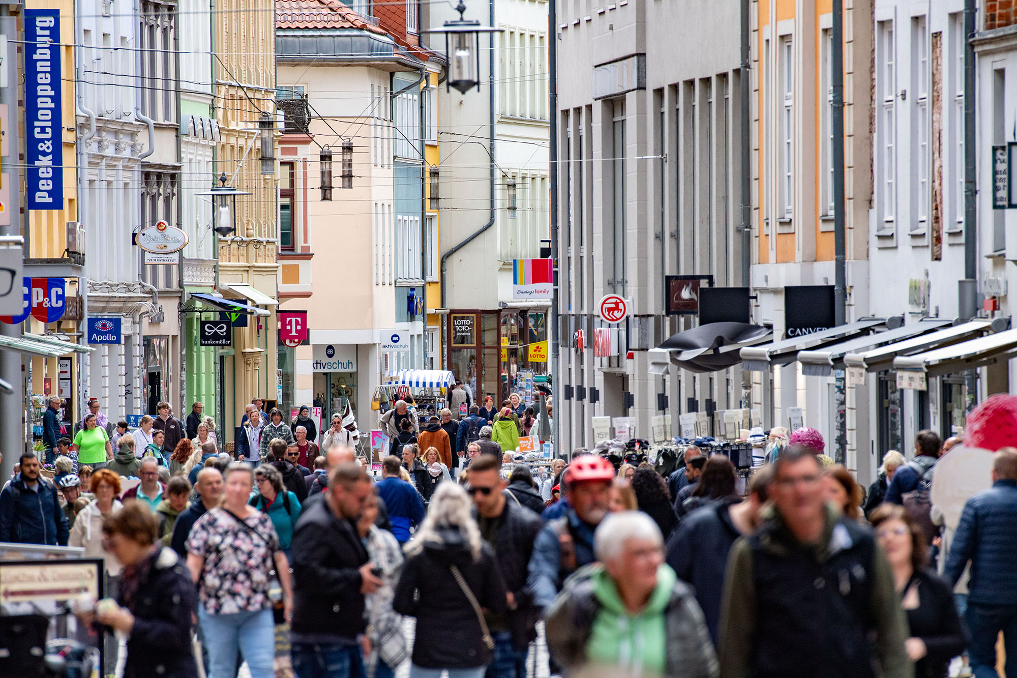 People shop on Ossenreyer Street in Stralsund, Mecklenburg-Western Pomerania, Germany, on May 20.