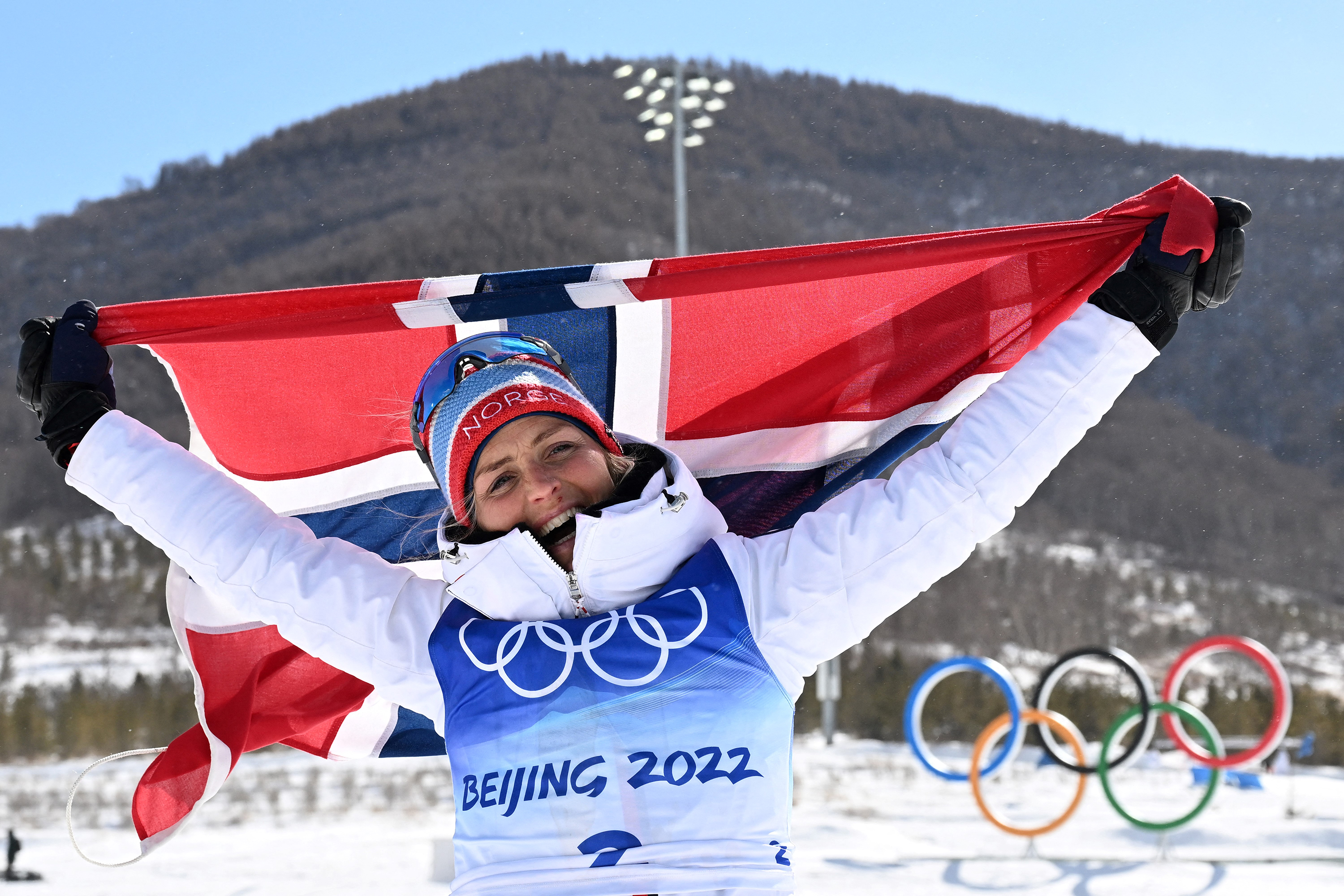 Norway's Therese Johaug wins three gold medals at the Beijing 2022 Winter Olympics.