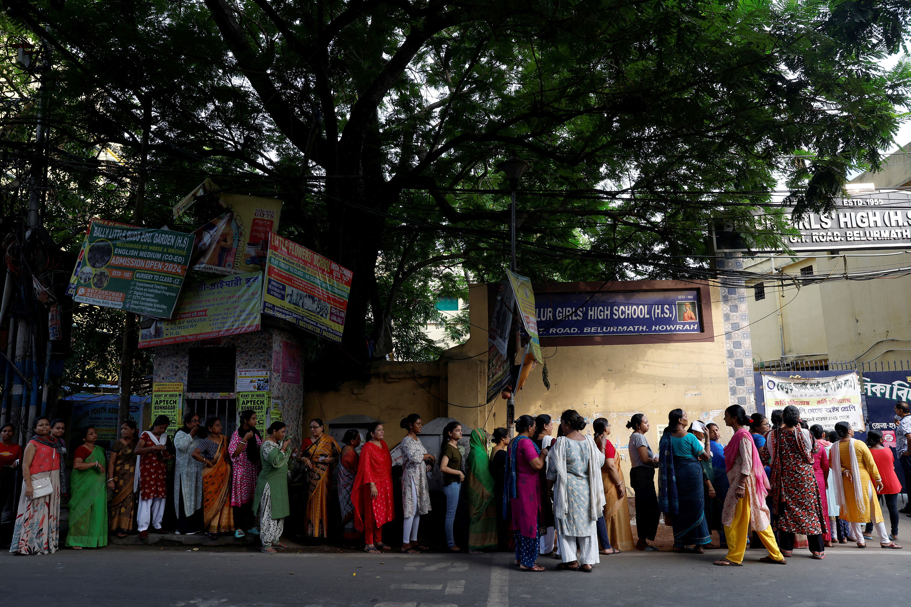 Women wait to enter a polling station to cast their votes during the fifth phase of India’s general election in Howrah district of the eastern state of West Bengal, India, on May 20. 