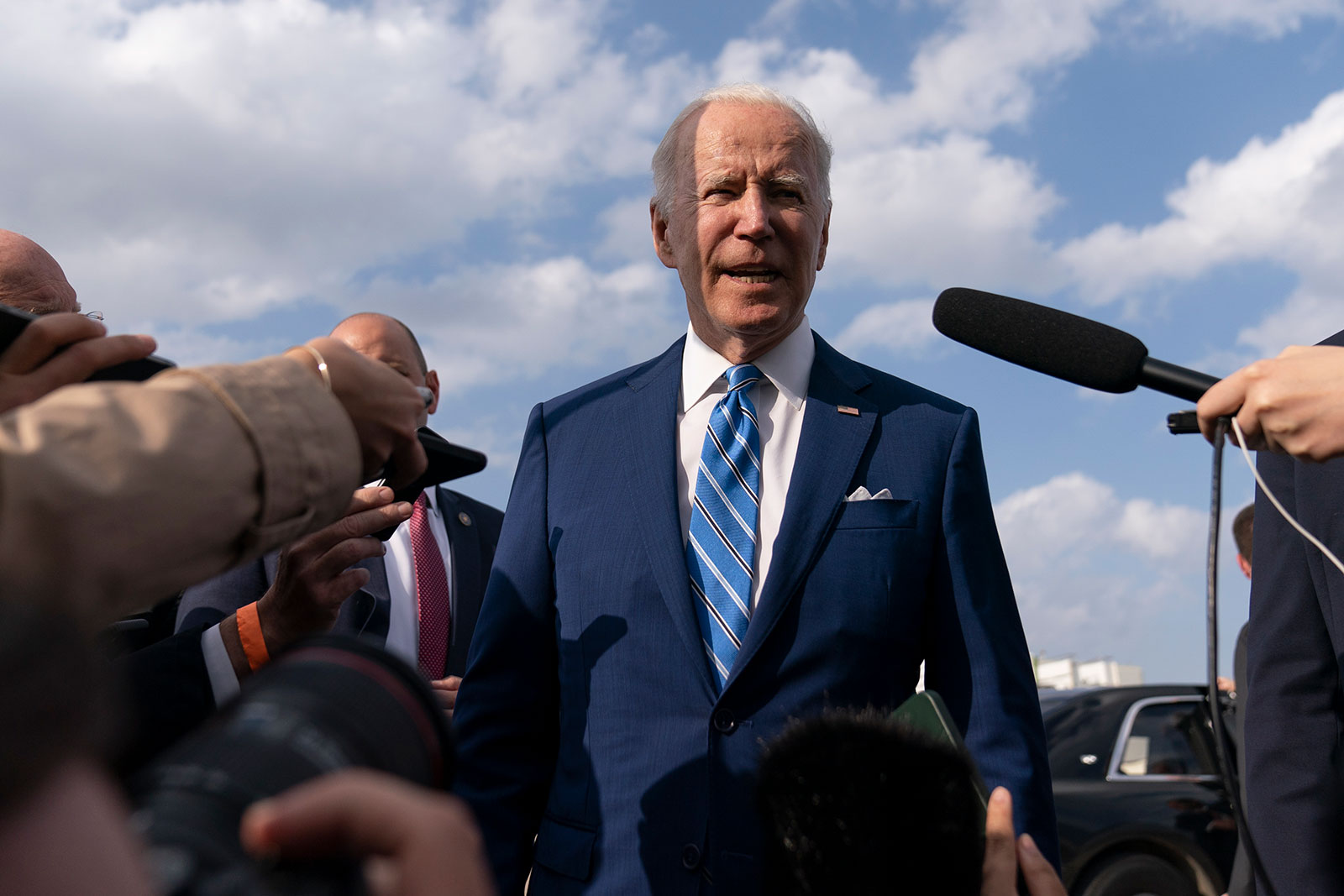 US President Joe Biden speaks to the media before boarding Air Force One at Des Moines International Airport in Des Moines, Iowa, on Tuesday, April 12. 
