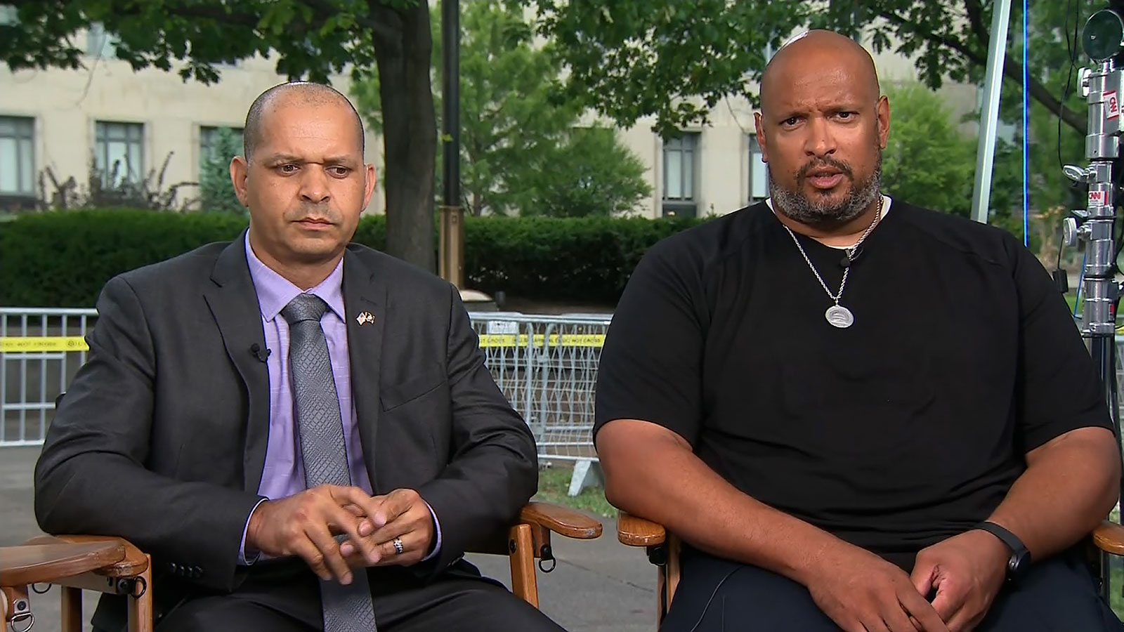 Former US Capitol Police Sgt. Aquilino Gonell, left, and Capitol Police officer Harry Dunn appear on CNN following Donald Trump's arraignment on Thursday, August 3.