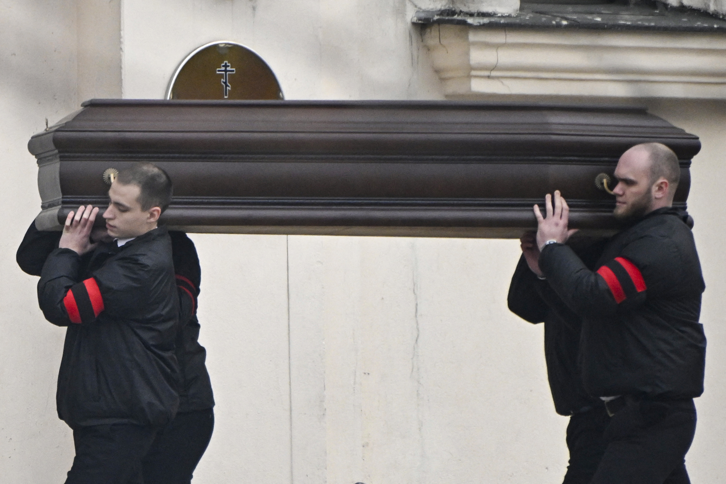 Pallbearers carry the coffin of Alexey Navalny into the Church of the Icon of the Mother of God 'Quench My Sorrows' for his funeral service in Moscow on Friday.