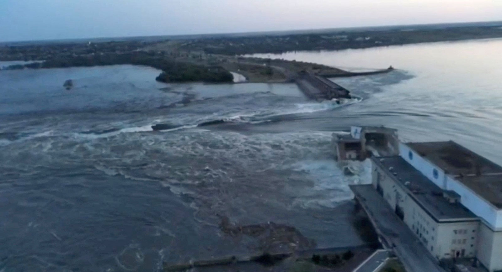 The breach in the Nova Kakhovka dam is seen in a screen grab taken from a video obtained by Reuters.