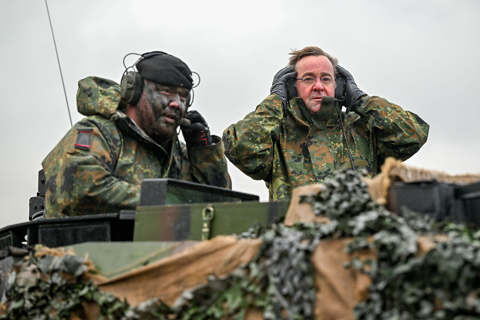 German Defense Minister Boris Pistorius rides in a Leopard 2 A6 main battle tank during a visit to the Bundeswehr's Panzerbataillon 203 tank squadron on February 1 in Augustdorf, Germany. 