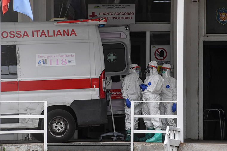 Ambulance and doctors at the Cotugno hospital emergency room for infectious diseases, in Naples on Friday, April 17. 