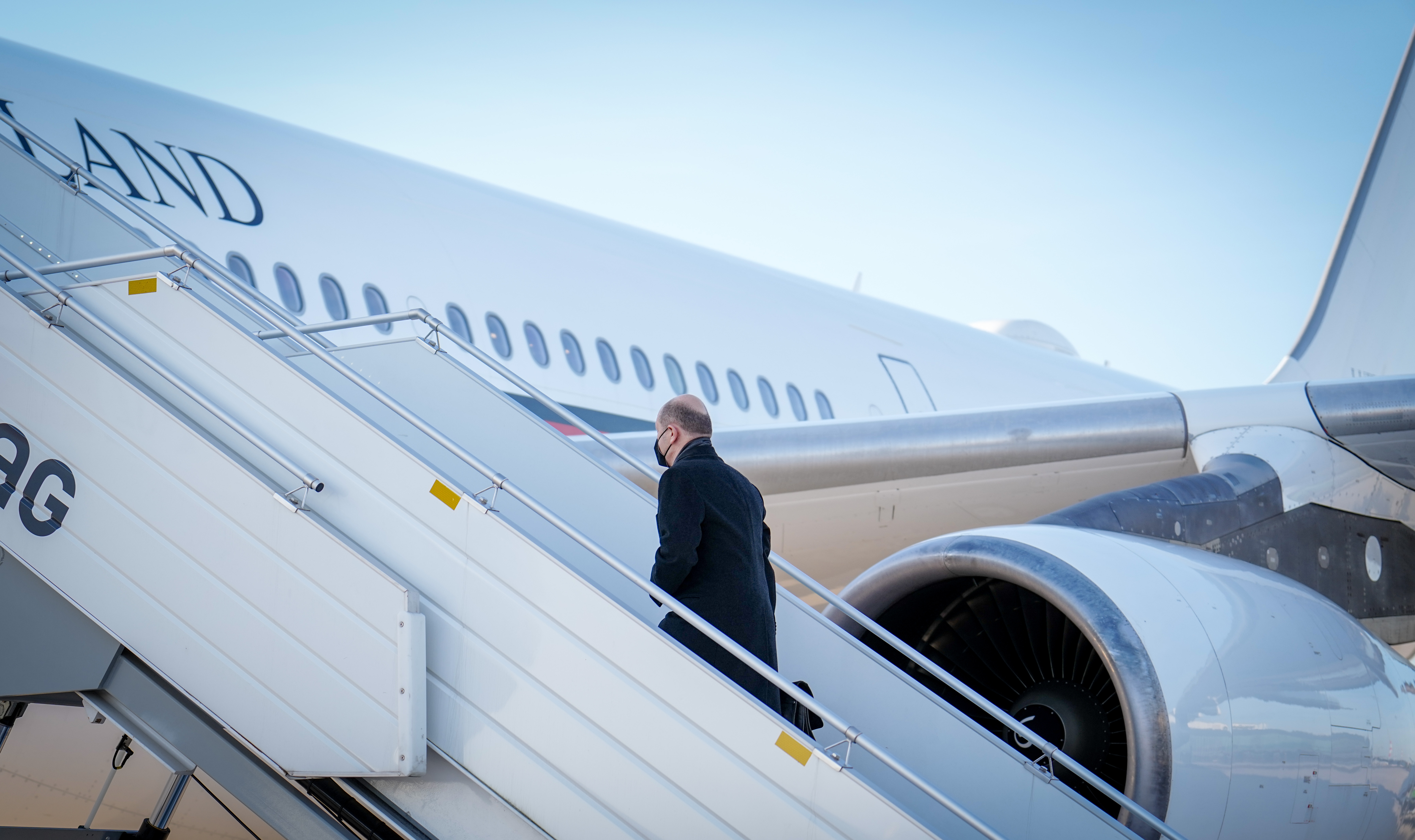 German Chancellor Olaf Scholz prepares to travel to Kyiv for talks on the Ukraine crisis, in Schönefeld, Brandenburg in Germany on February 14. 