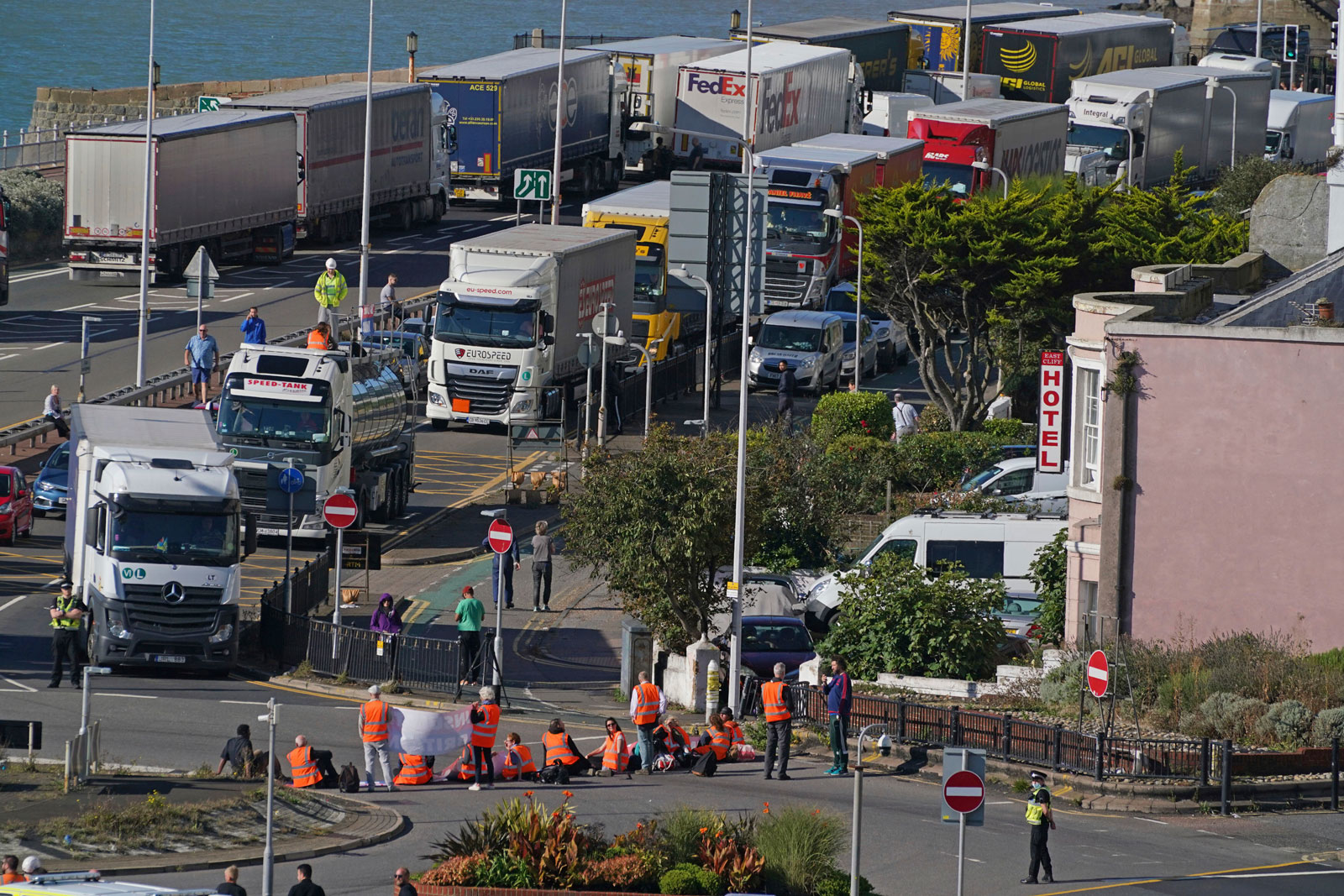 Protesters from Insulate Britain block the A20 which provides access to the Port of Dover, in Kent, England on Friday, September 24.