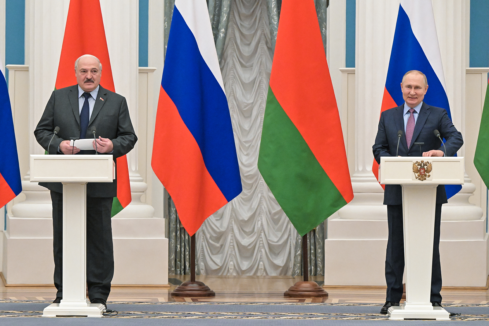 Belarusian President Alexander Lukashenko, left, and Russian President Vladimir Putin during a joint news conference following their talks at the Kremlin in Moscow, on February 18. 