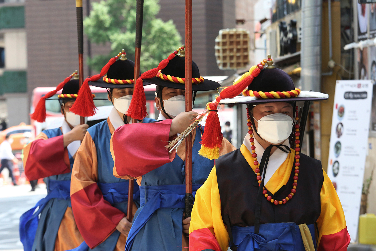 South Korean Imperial guards wear face masks near the Deoksu Palace in Seoul, South Korea, on July 3.