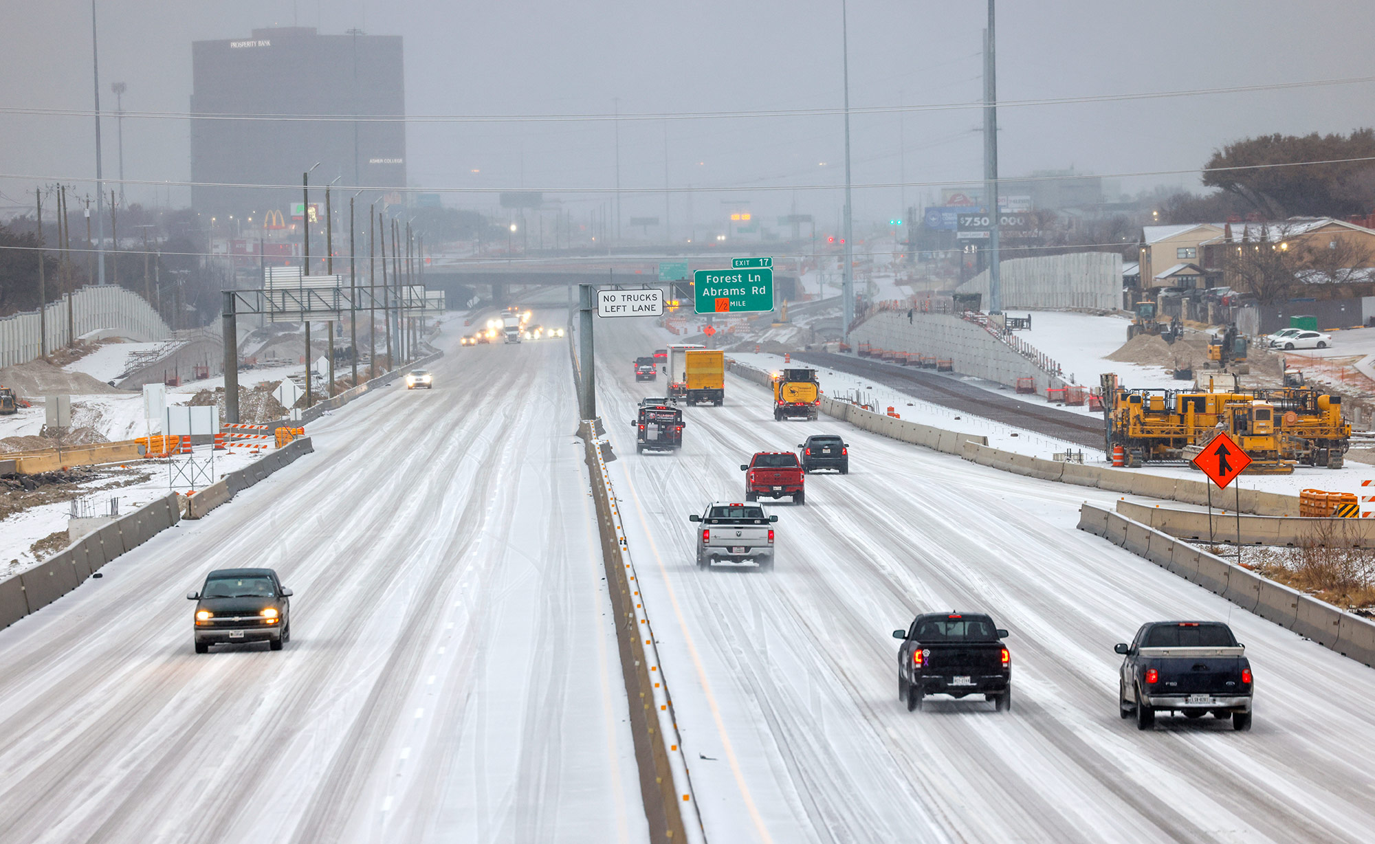 Motorists drive on icy roads in Dallas, on Tuesday, January 31. 