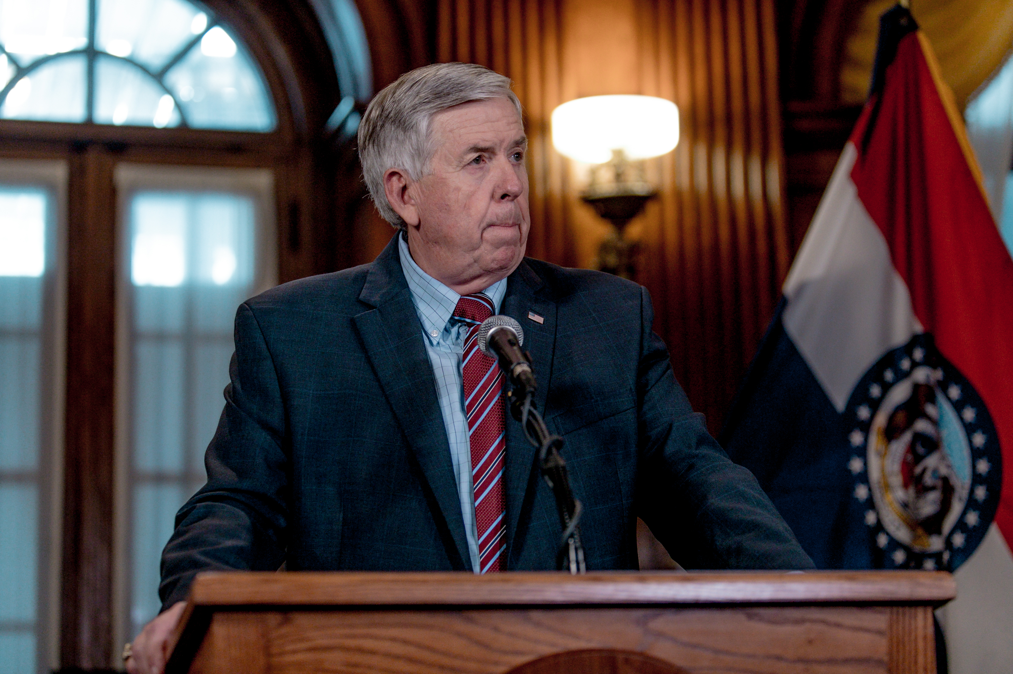 Gov. Mike Parson listens to a media question during a press conference in Jefferson City, Missouri on May 29, 2019.