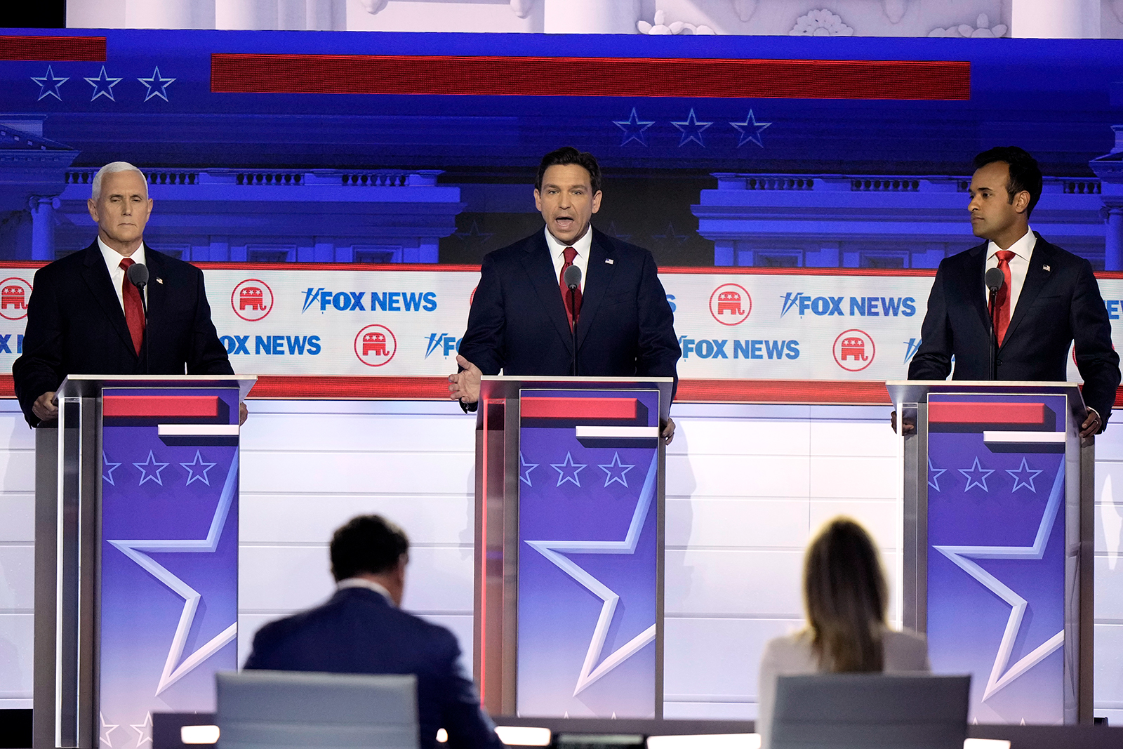 Florida Gov. Ron DeSantis, center, speaks during the first Republican primary debate on August 23, in Milwaukee, Wisconsin. 