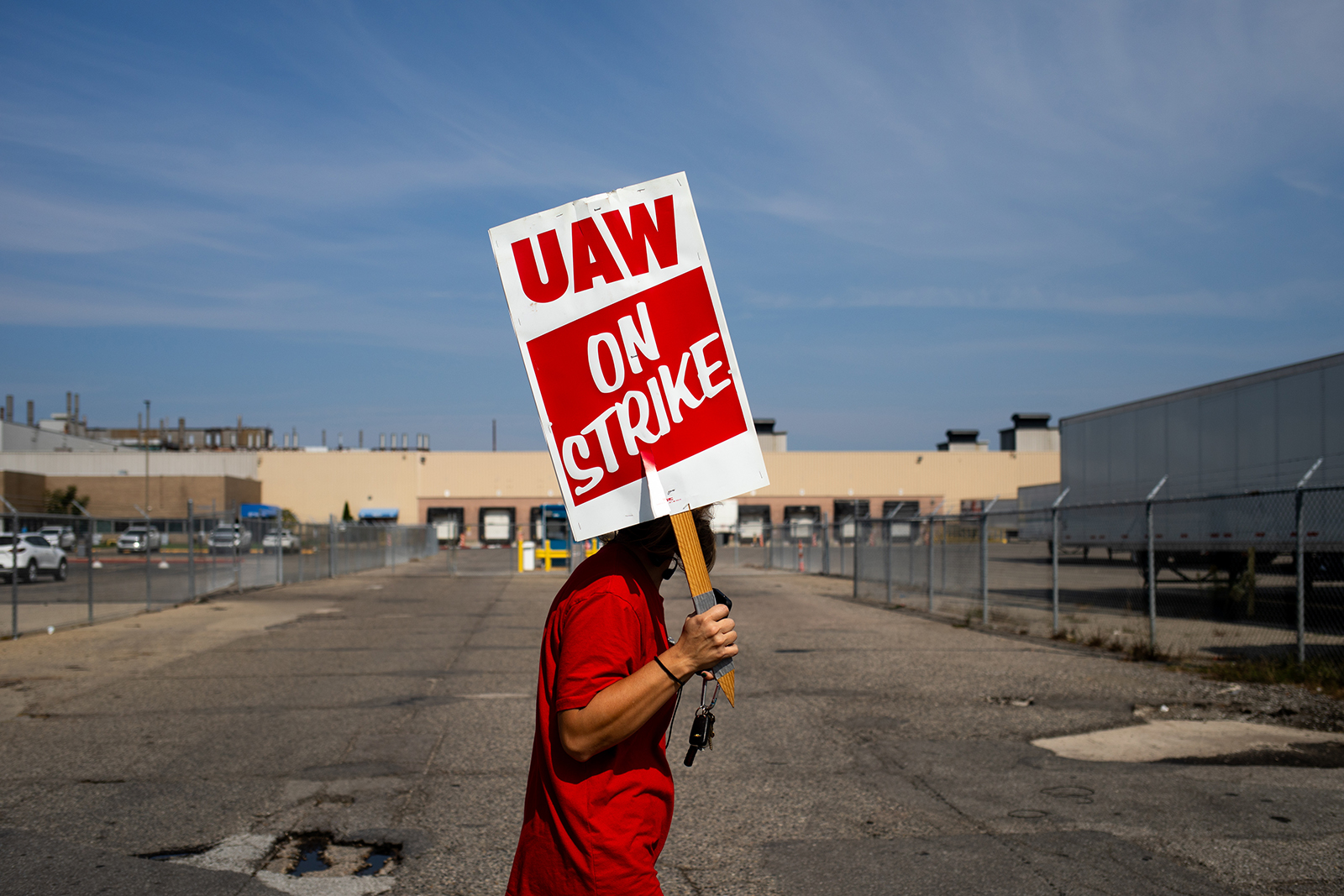 A "UAW On Strike" sign held on a picket line outside the main entrance at the General Motors Co. Ypsilanti Processing Center in Ypsilanti, Michigan, today.