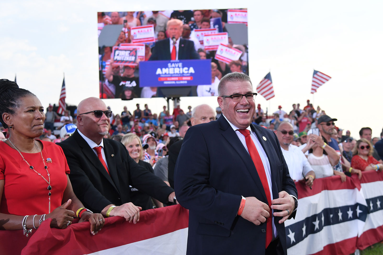 Darren Bailey smiles before getting support from former President Donald Trump during the Save America Rally in Mendon, Illinois, on June 25. 
