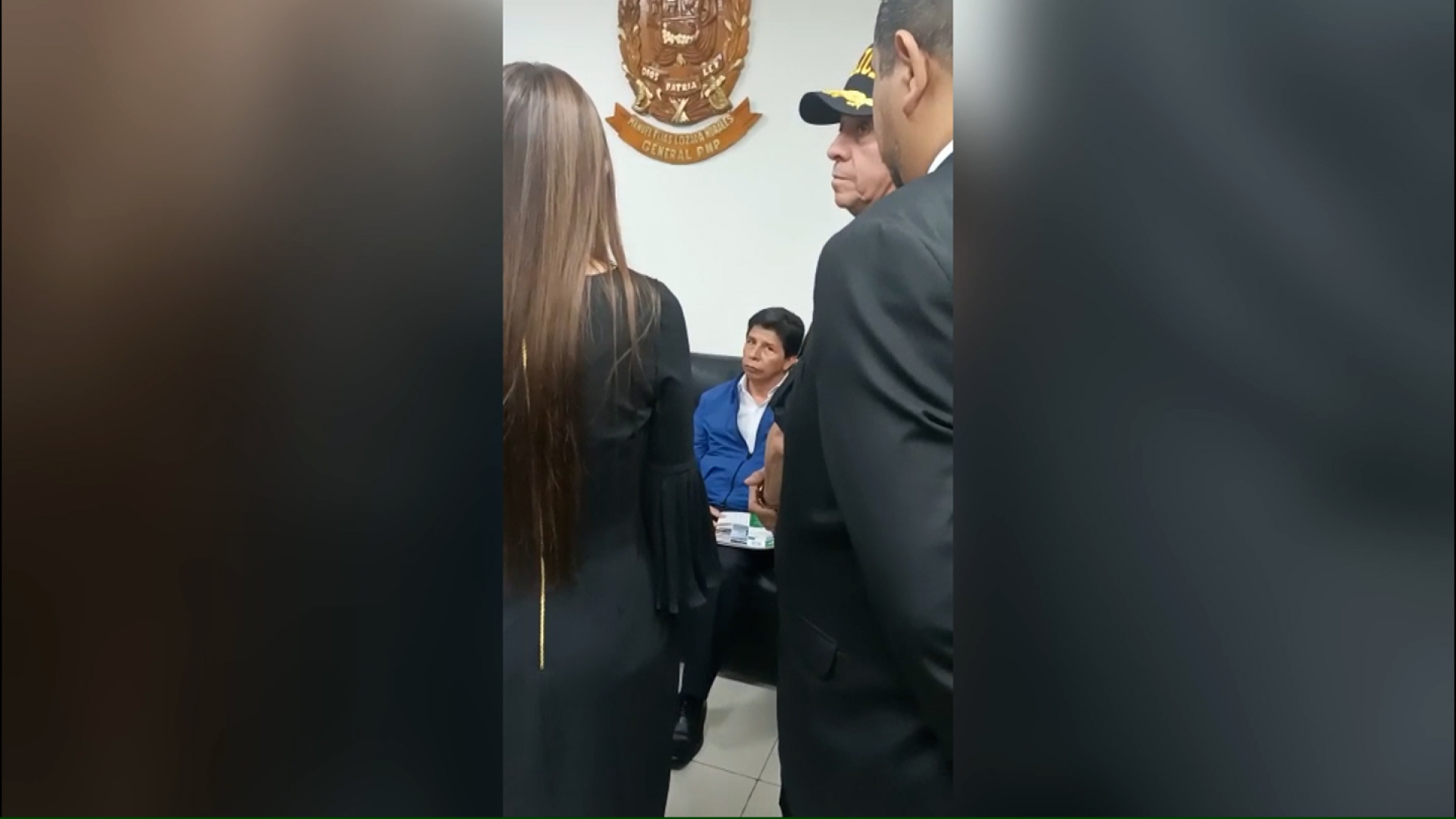 Former Peruvian President Pedro Castillo being detained in Lima Prefecture.