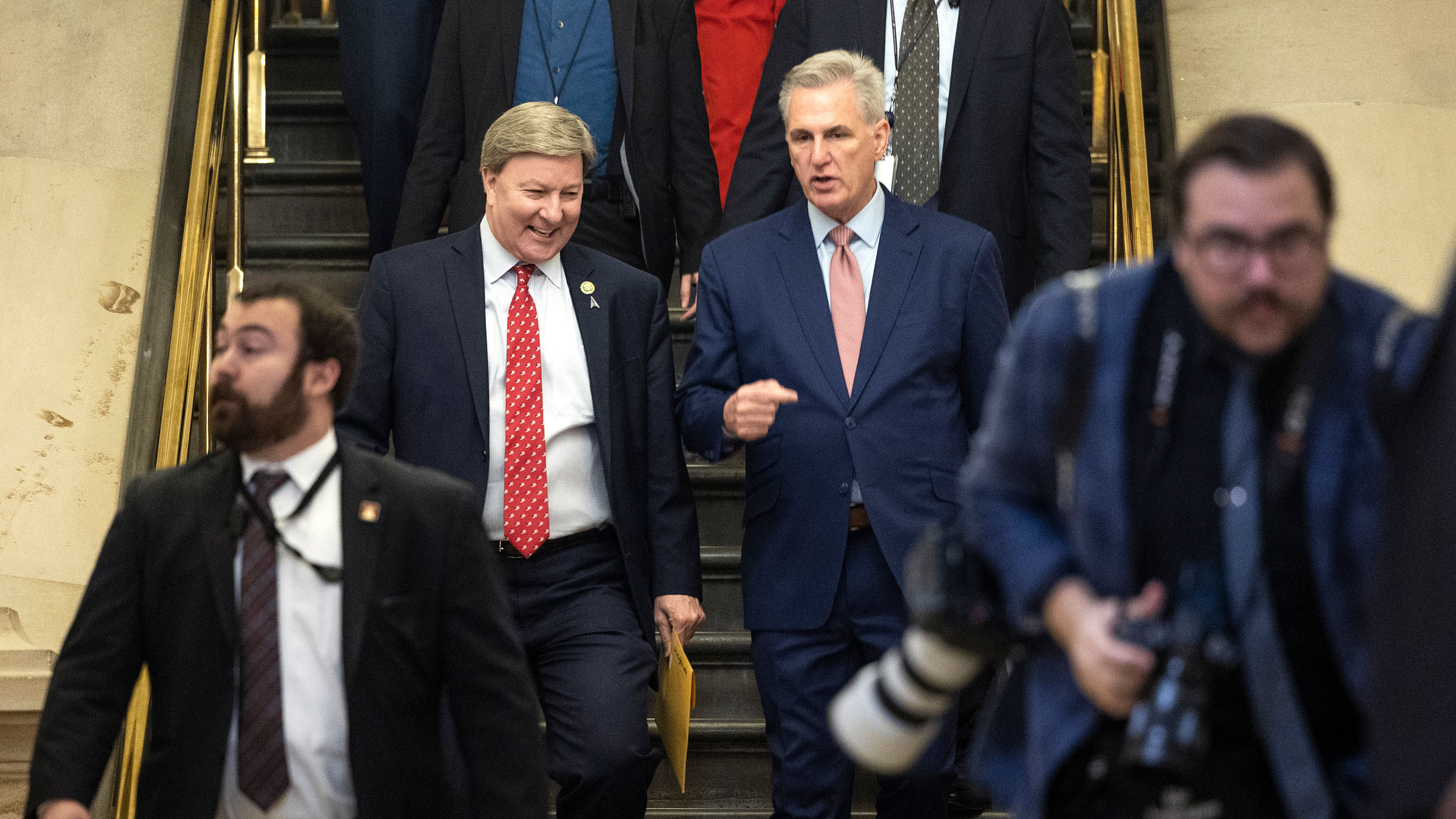 Kevin McCarthy, center right, walks to his meeting with House Republicans on Tuesday.