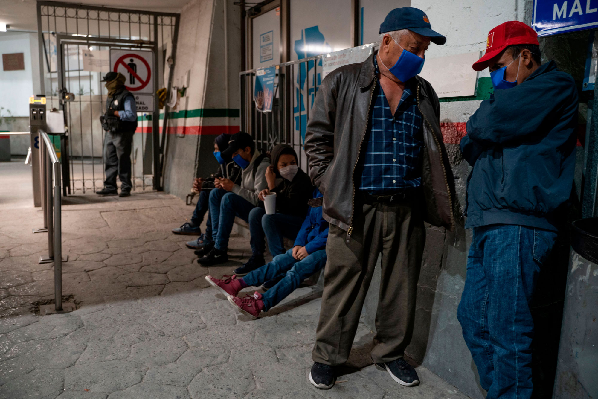 Migrants in the Migrant Protection Protocols program wait to enter the Paso del Norte International Bridge on April 6, in Ciudad Juarez in the state of Chihuahua, Mexico.