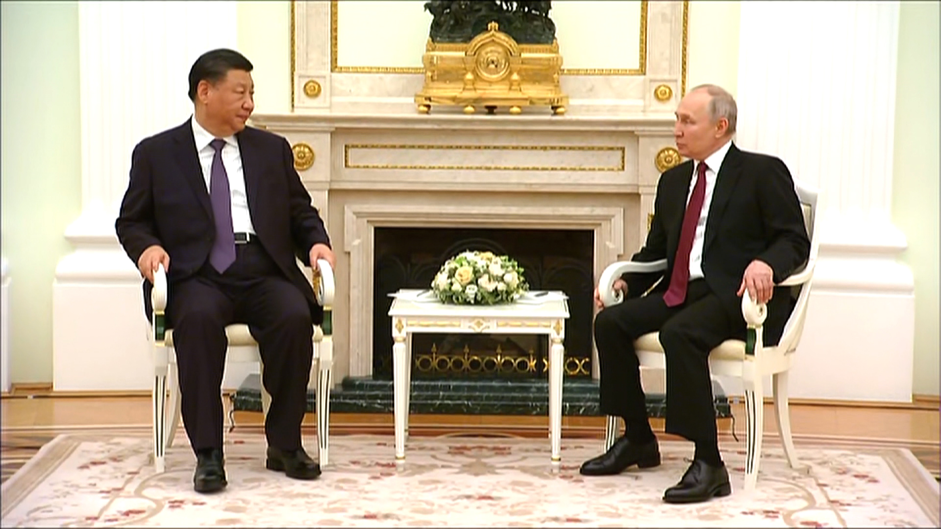 Russian President Vladimir Putin, right, welcomes Chinese President Xi Jinping to the Kremlin in Moscow, Russia, on March 20.