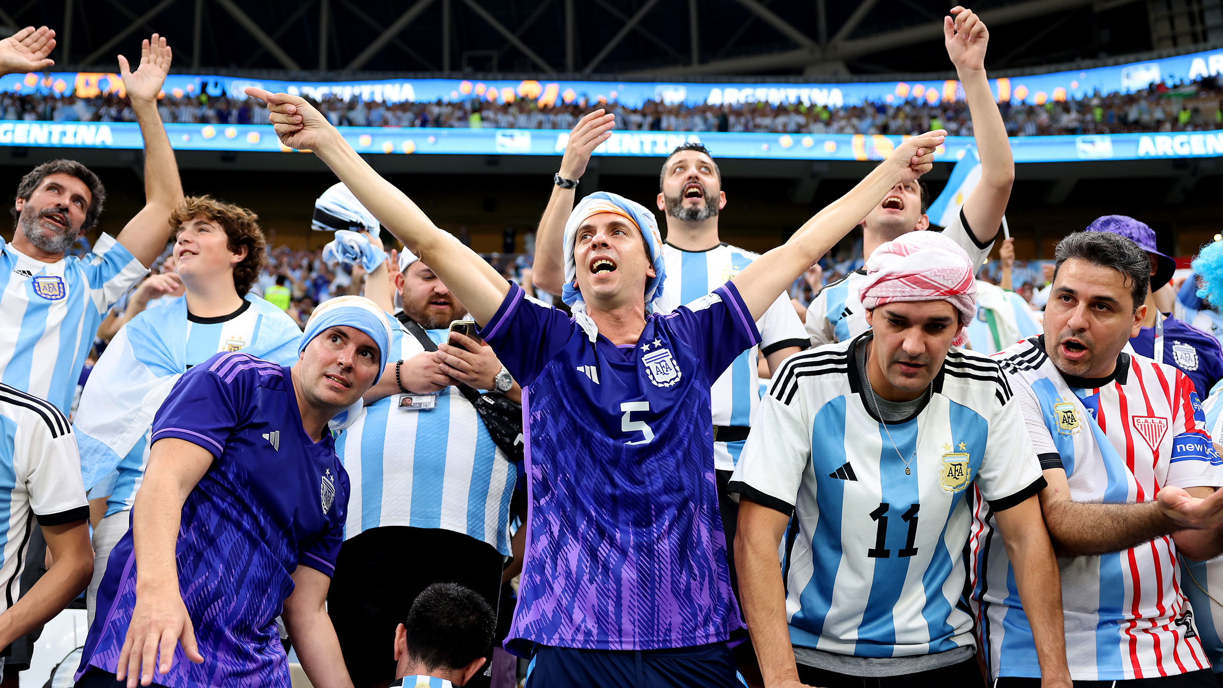 Argentina fans support their team inside the Lusail Stadium on Sunday.