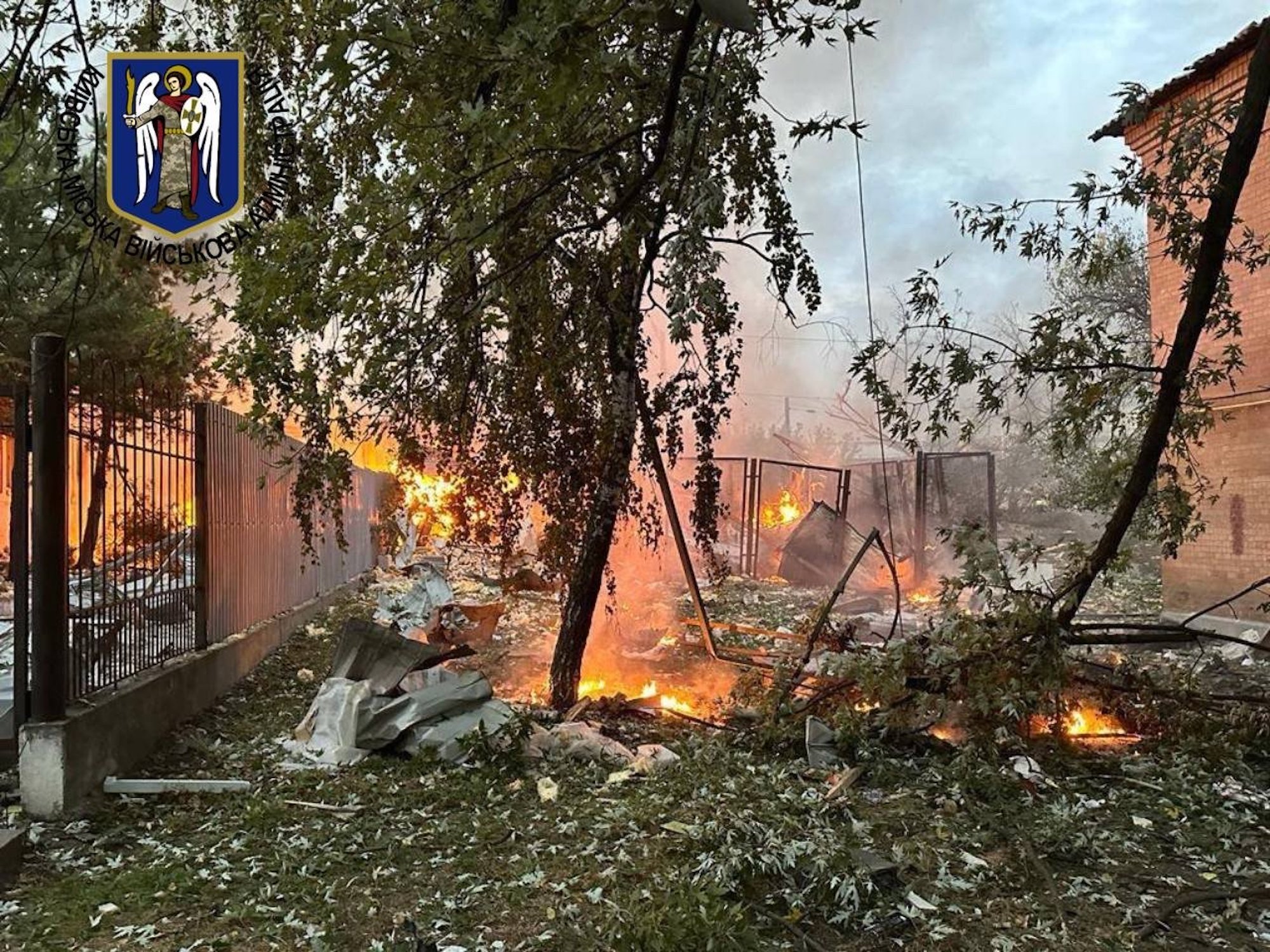 Debris is seen in Kyiv's Darnytskyi district following Russian attacks on Thursday.