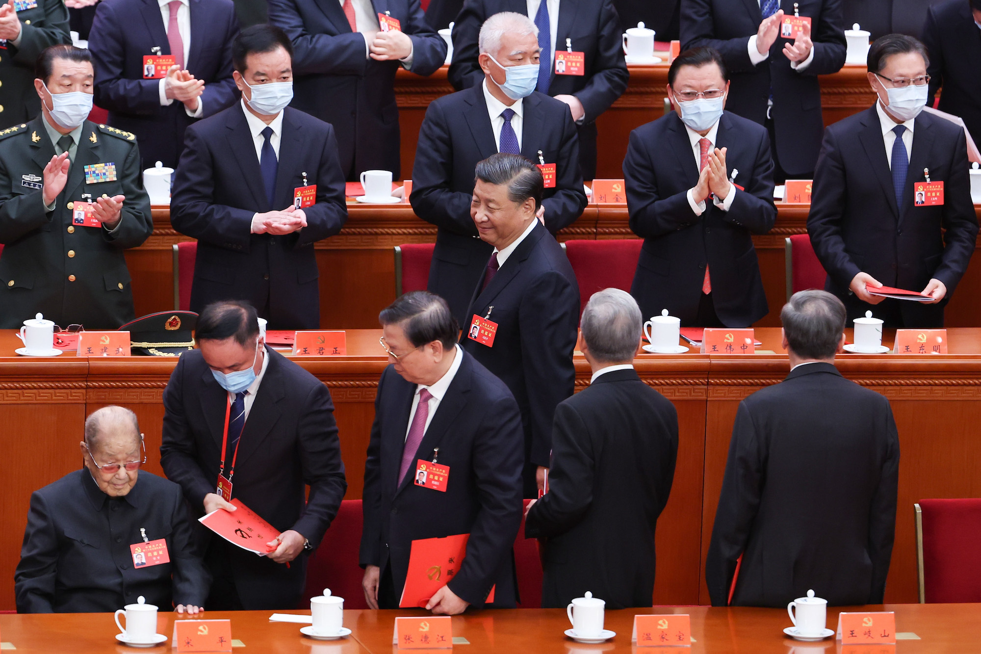 Xi Jinping takes his departure at the conclusion of the closing ceremony on October 22.