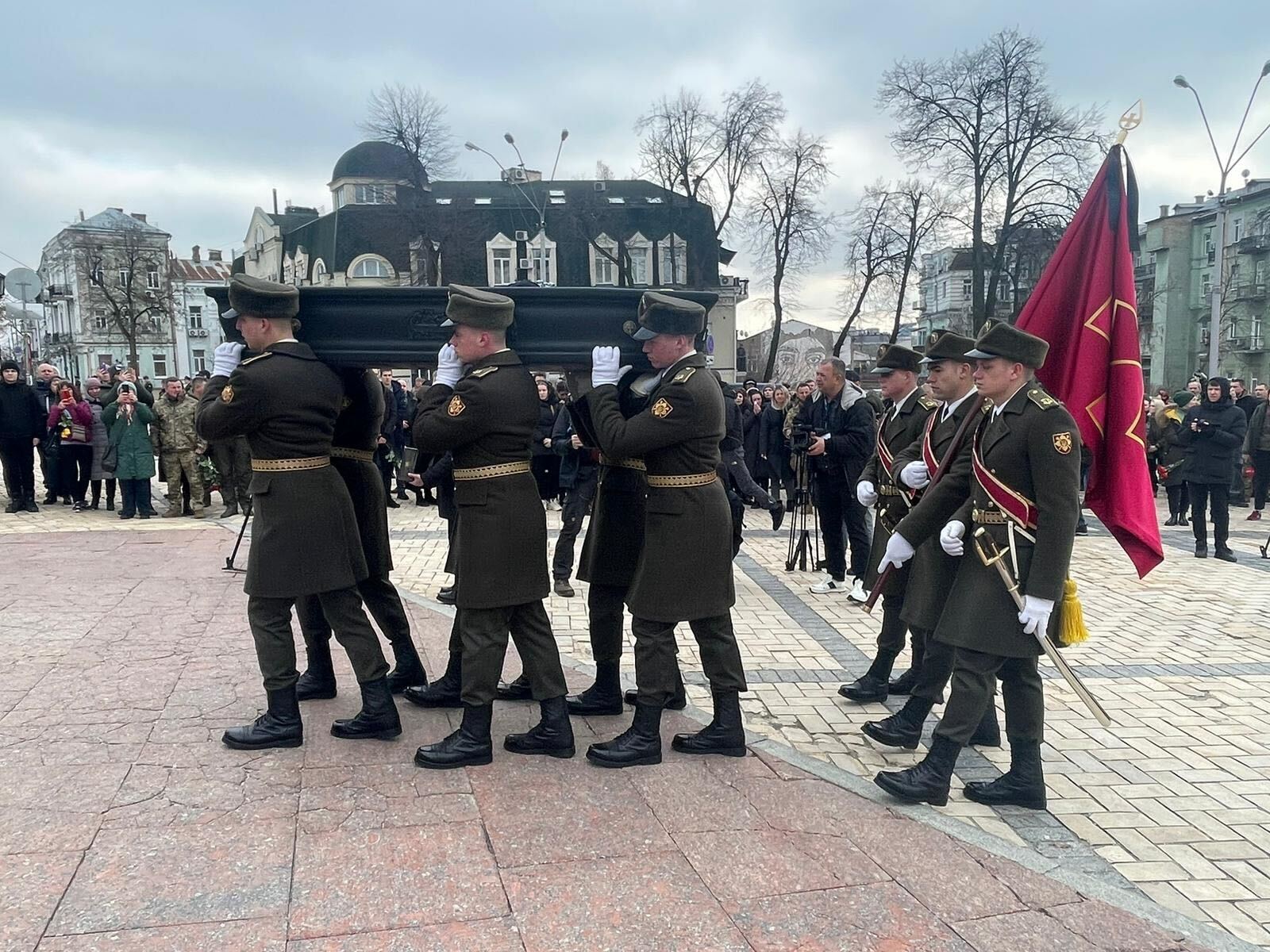 Dmytro Kotsiubaylo's casket being carried into the golden-domed St. Michael’s Monastery in Kyiv, Ukraine, on March 10.