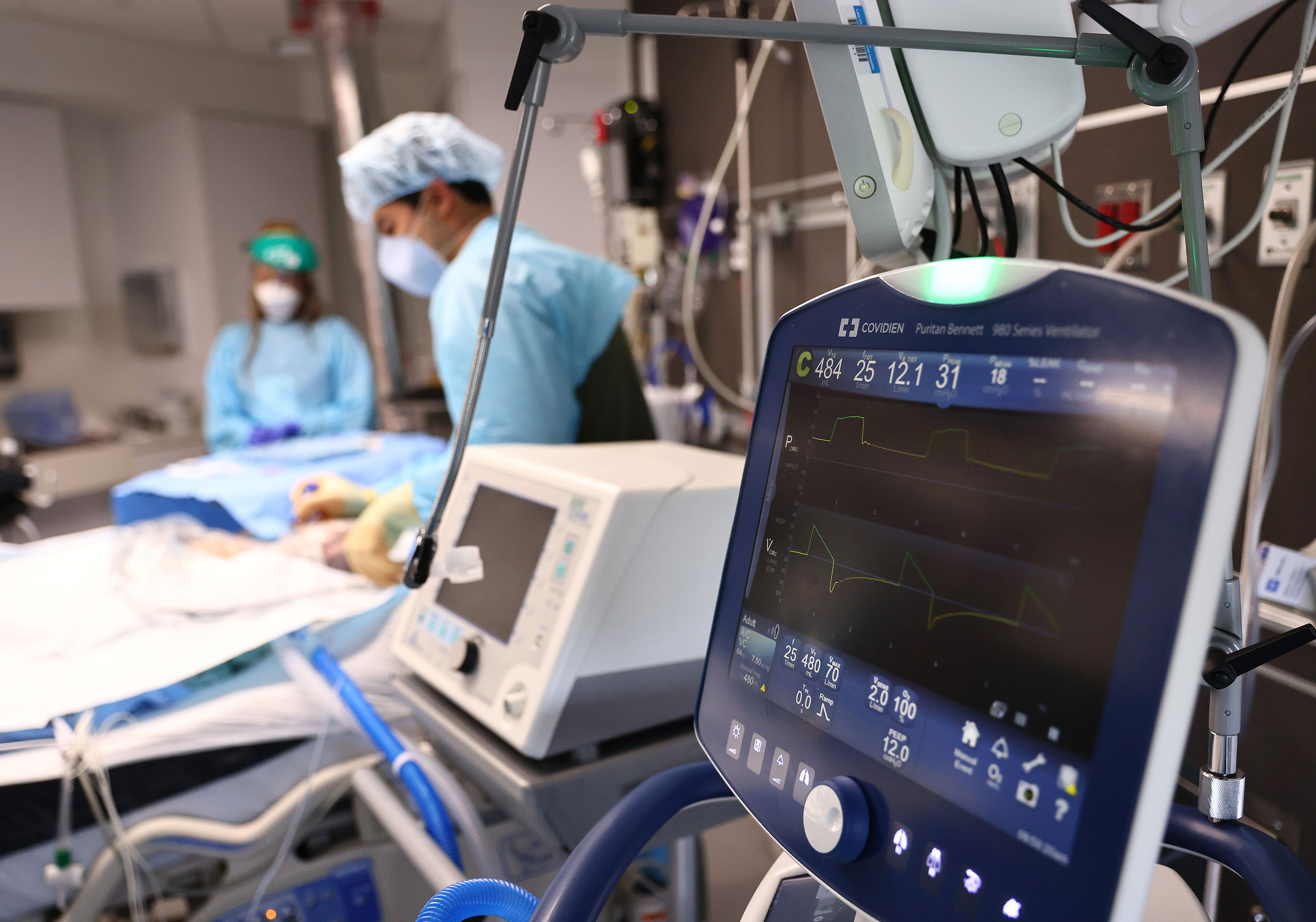 Clinicians care for a Covid-19 patient in the Intensive Care Unit at Lake Charles Memorial Hospital in Lake Charles, Louisiana, on August 10.