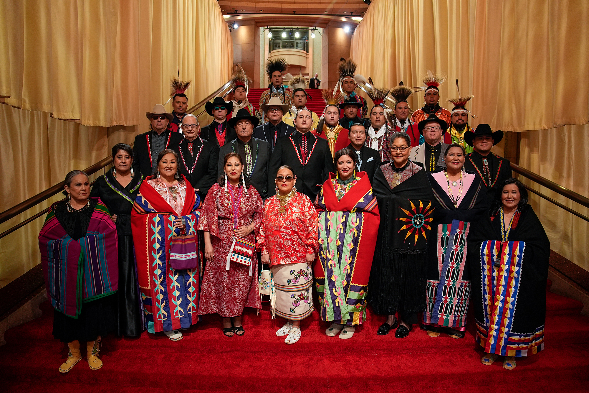 Members of the Osage Nation arrive at the Academy Awards red carpet on Sunday, March 10, in Los Angeles. 
