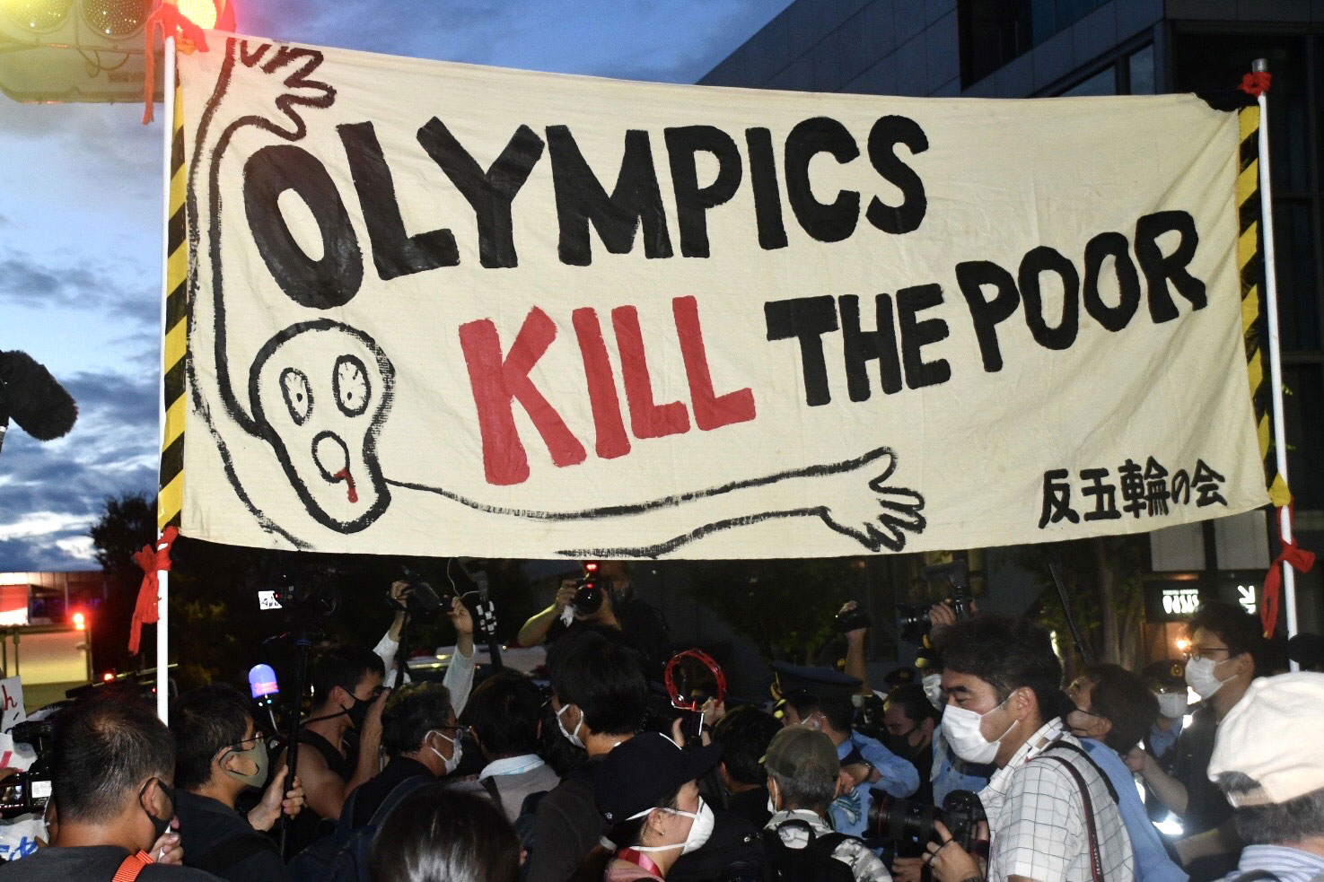 The Olympics cost "lives and livelihoods," say protesters in Tokyo