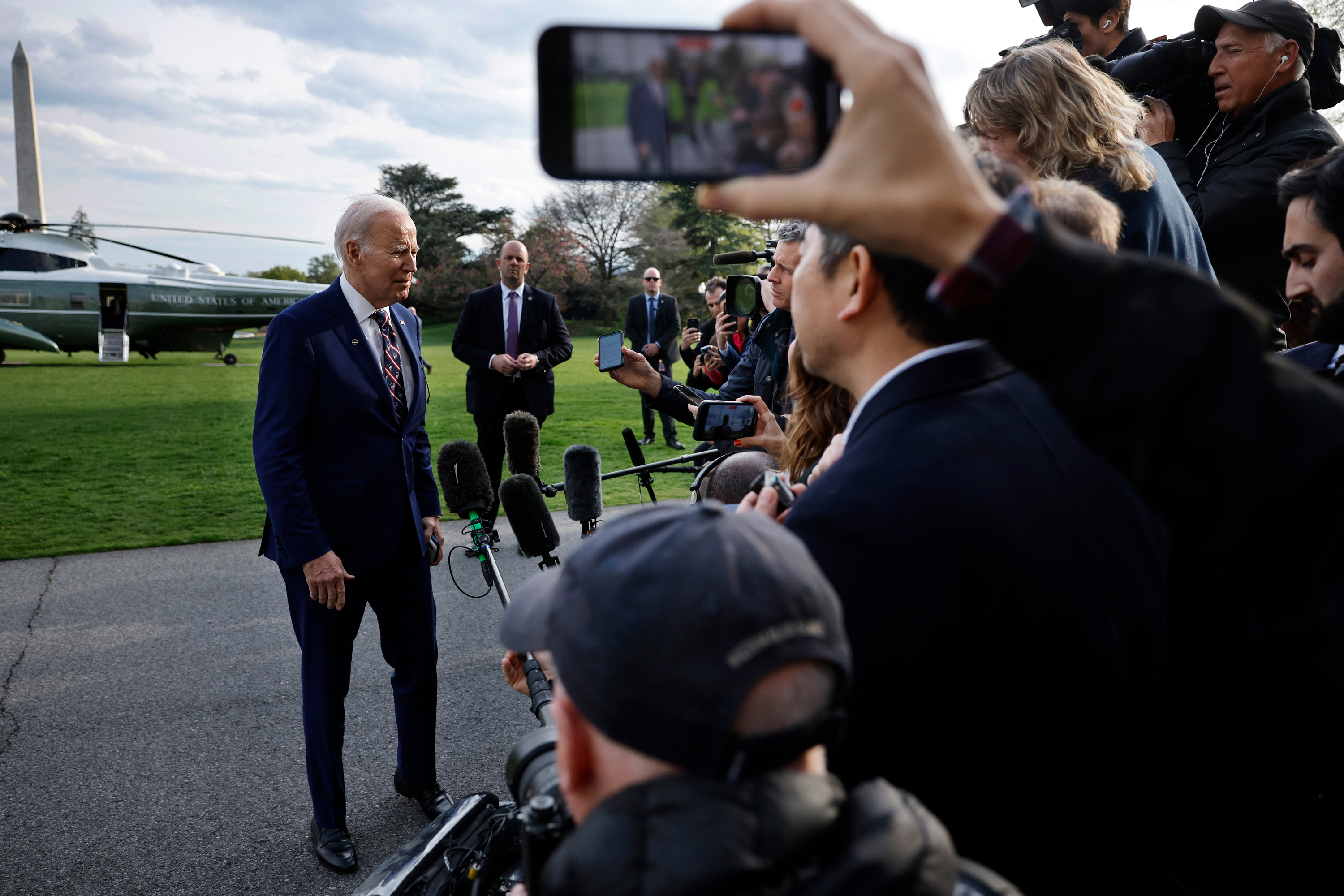 President Joe Biden briefly speaks with reporters as he returns to the White House in Washington, DC, on Tuesday.