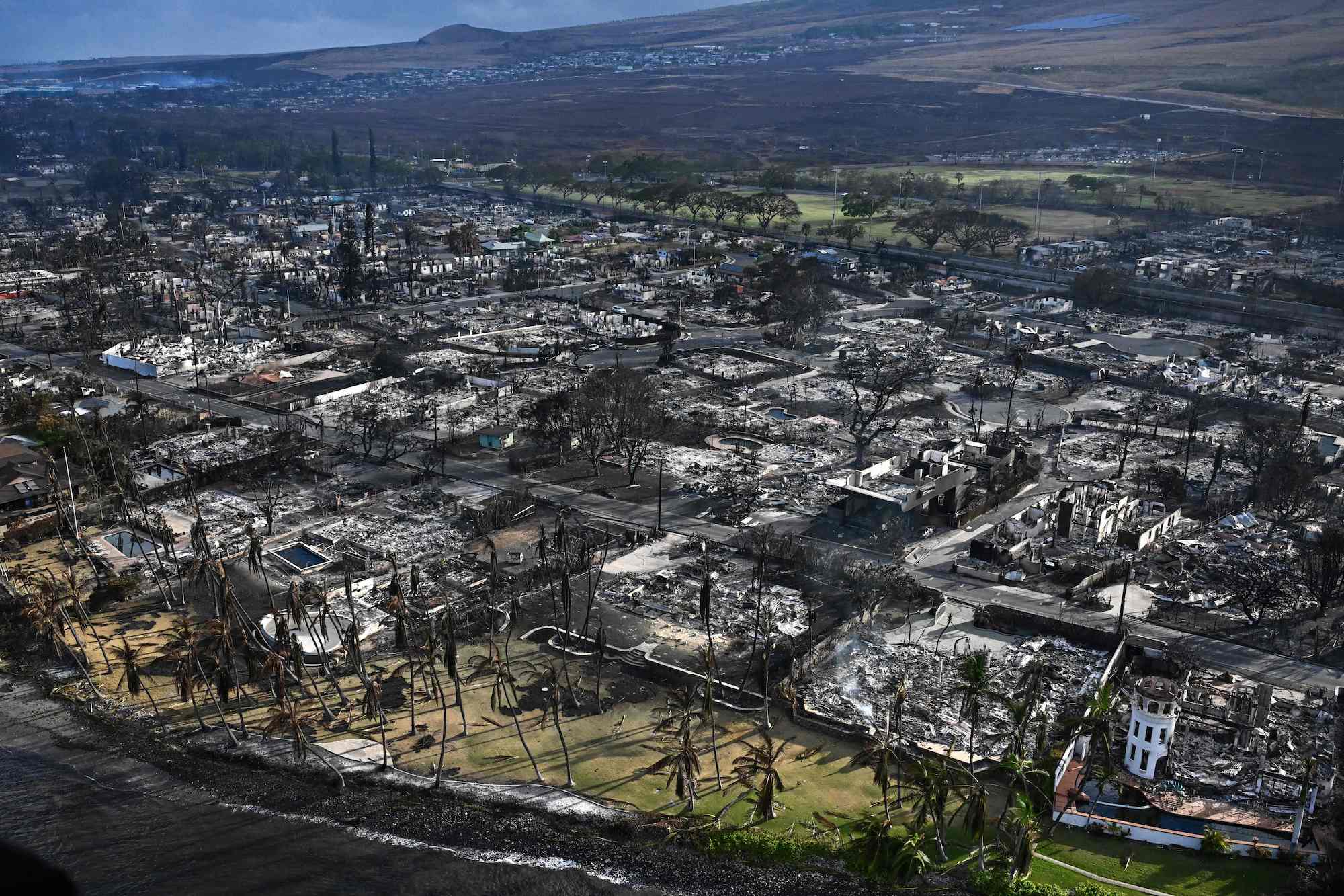 An aerial view shows destroyed homes and buildings on the waterfront burned to the ground in Lahaina, western Maui, on Thursday.