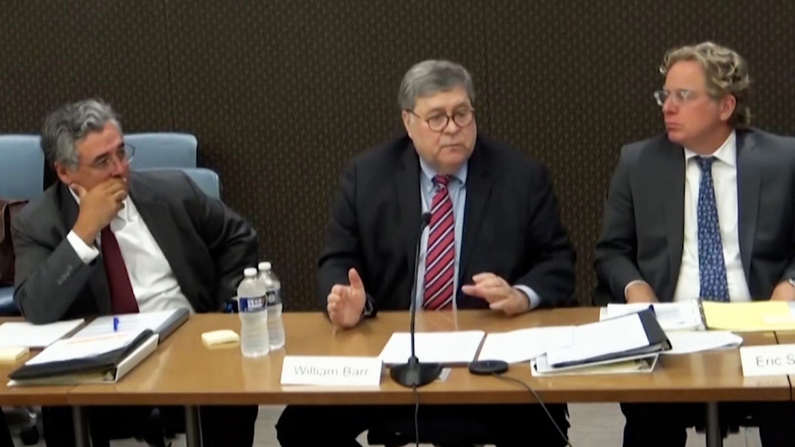 The recorded testimony of former Attorney General Bill Barr, center, was shown again on Tuesday.