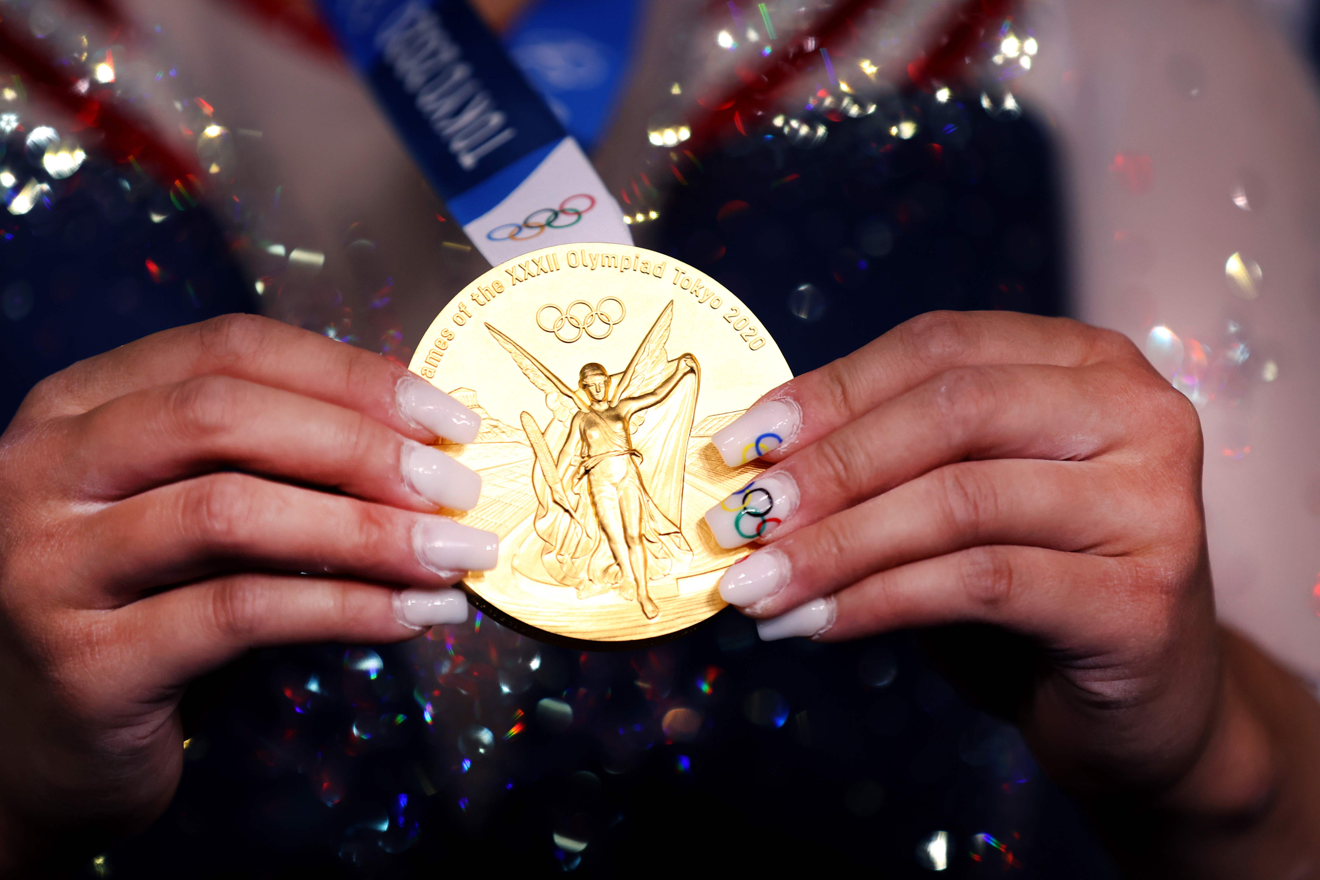 USA's Sunisa Lee holds her gold medal after winning the all-around gymnastics final on July 29.