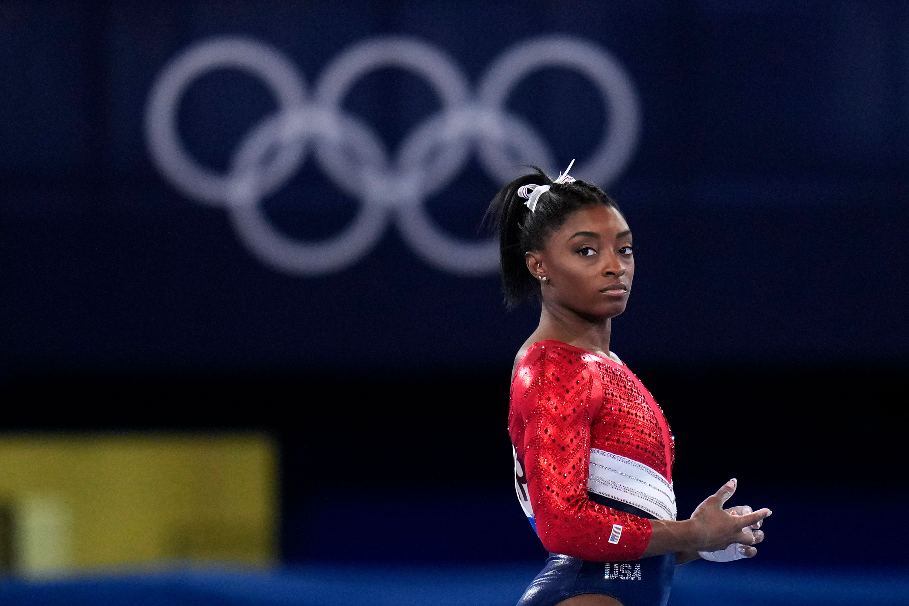 Simone Biles waits to perform on the vault during the artistic gymnastics final on July 27.