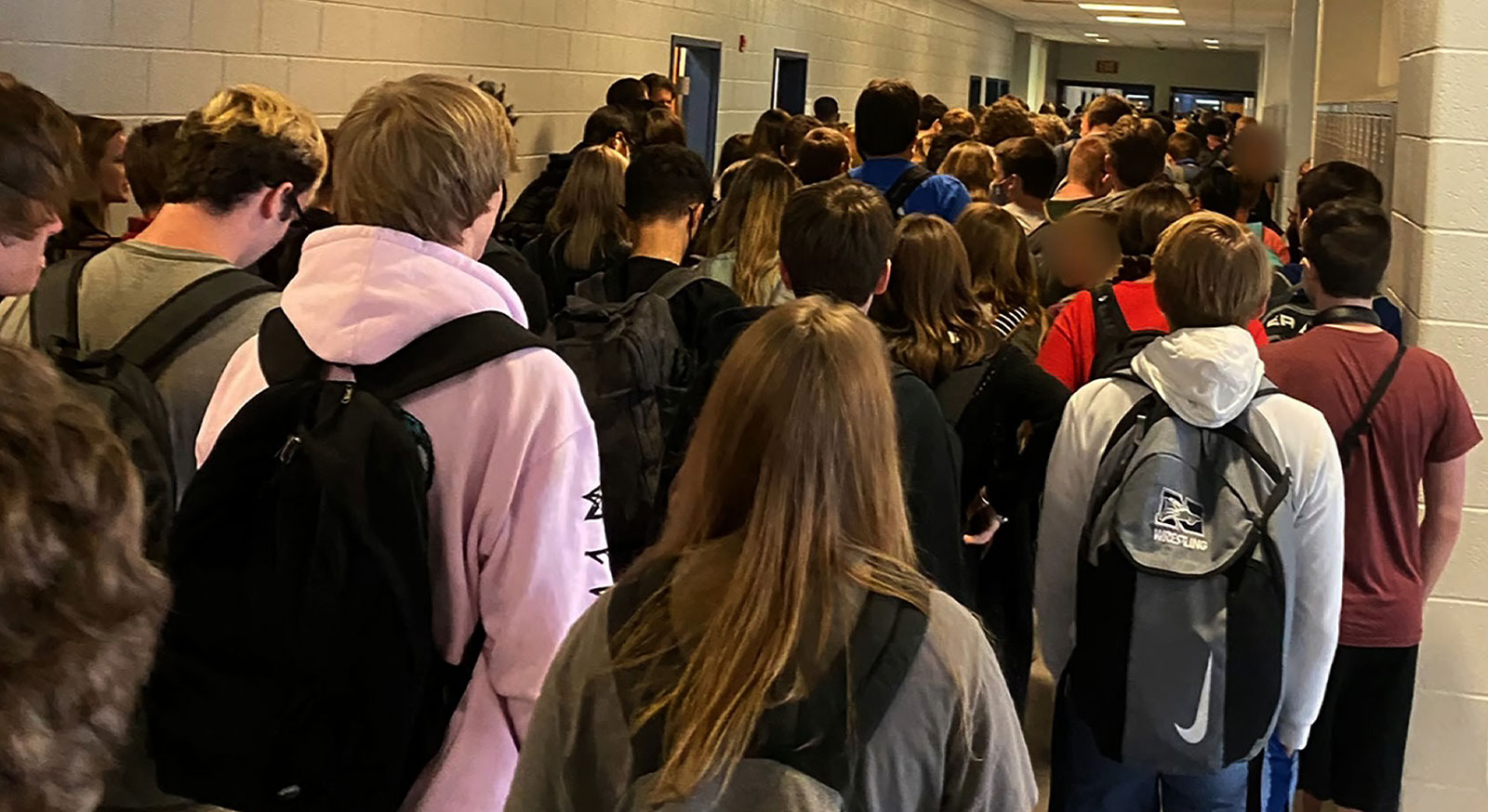 Students at North Paulding High School walk through a crowded hallway.