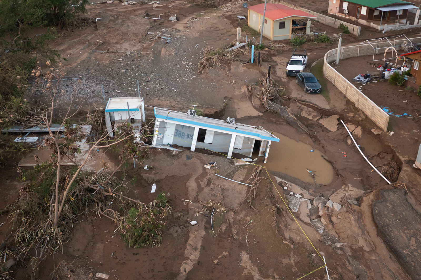 A house lays in the mud after it was washed away by Hurricane Fiona at Villa Esperanza in Salinas, Puerto Rico, on Wednesday, Sept. 21.