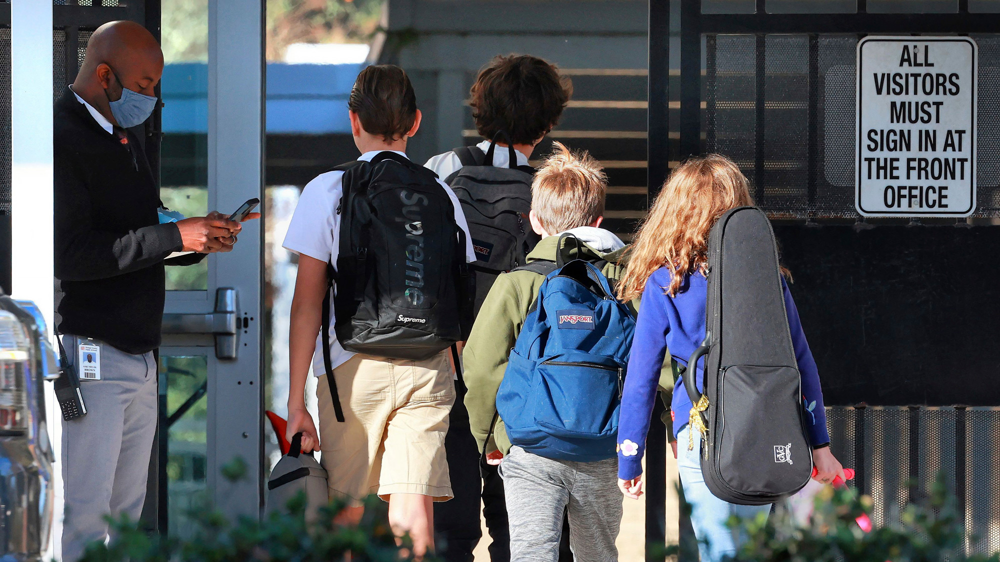 Students arrive at Maitland Middle School on the first day of classes after the winter break, Tuesday, January 4.