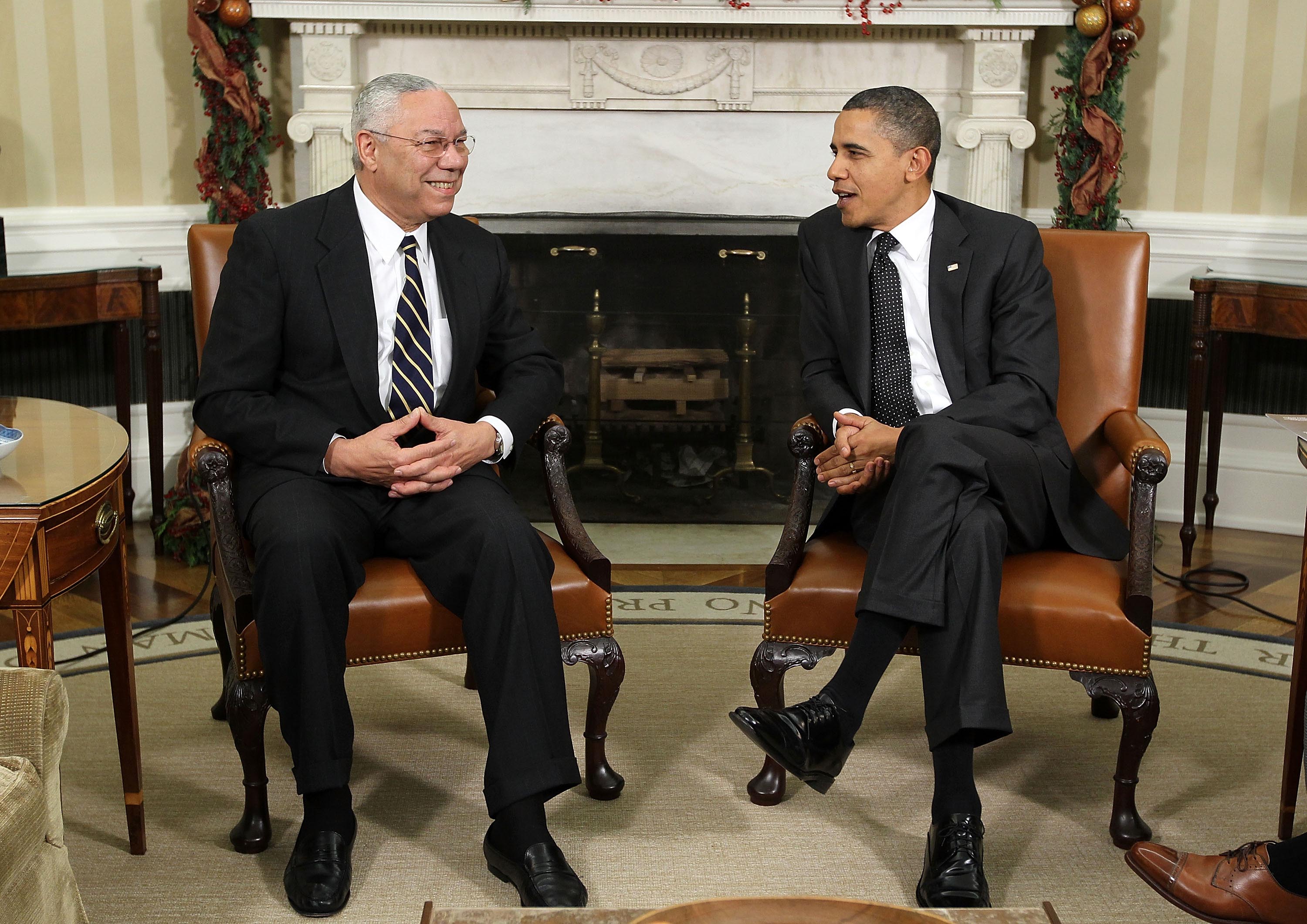 Then-President Barack Obama meets with former Secretary of State General Colin Powell in the Oval Office of the White House December 1, 2010 in Washington, DC.  