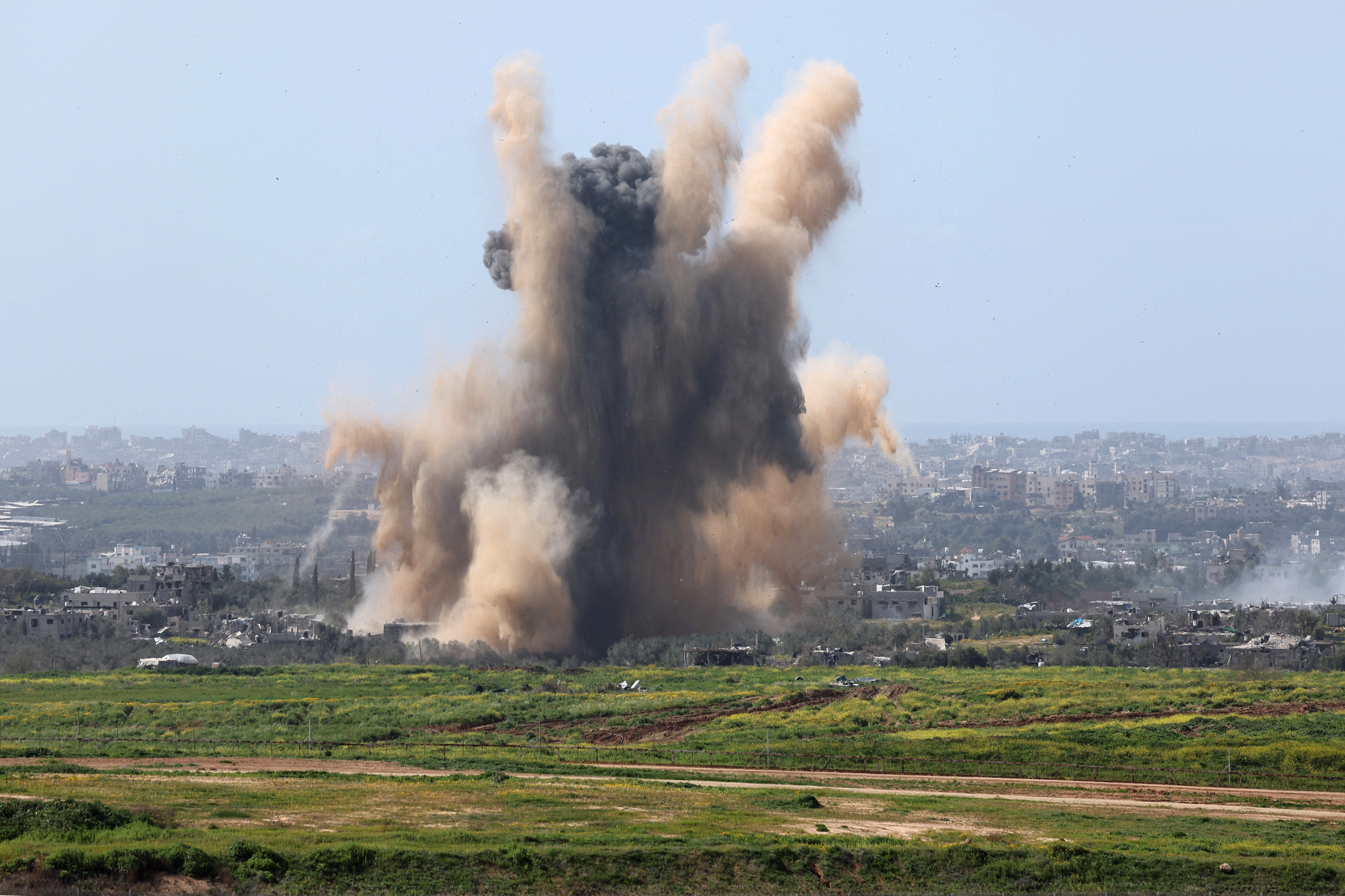 A photo taken from southern Israel shows smoke billowing in Gaza amid Israeli bombardment on March 6.